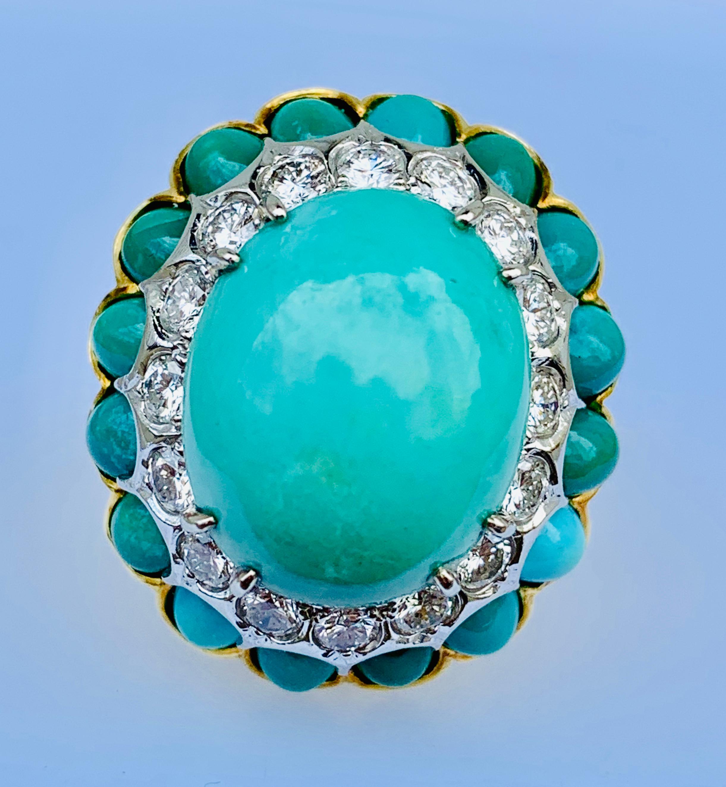 Gorgeous Vintage la Triomphe Ladies Dome Ring! This piece is made in 18K yellow Gold and has a stunning 17 x 14mm Oval Turquoise at its center! The center stone is surrounded by a band of 16, round, brilliant cut diamonds that are G-H in color and
