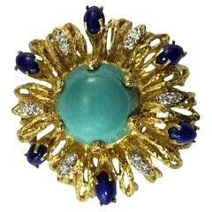 Broche La Triomphe en or jaune 18 carats, turquoise, lapis-lazuli et diamants n° 18652
