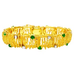 Armband aus 18 Karat Gold mit Smaragd und Diamanten von La Triomphe