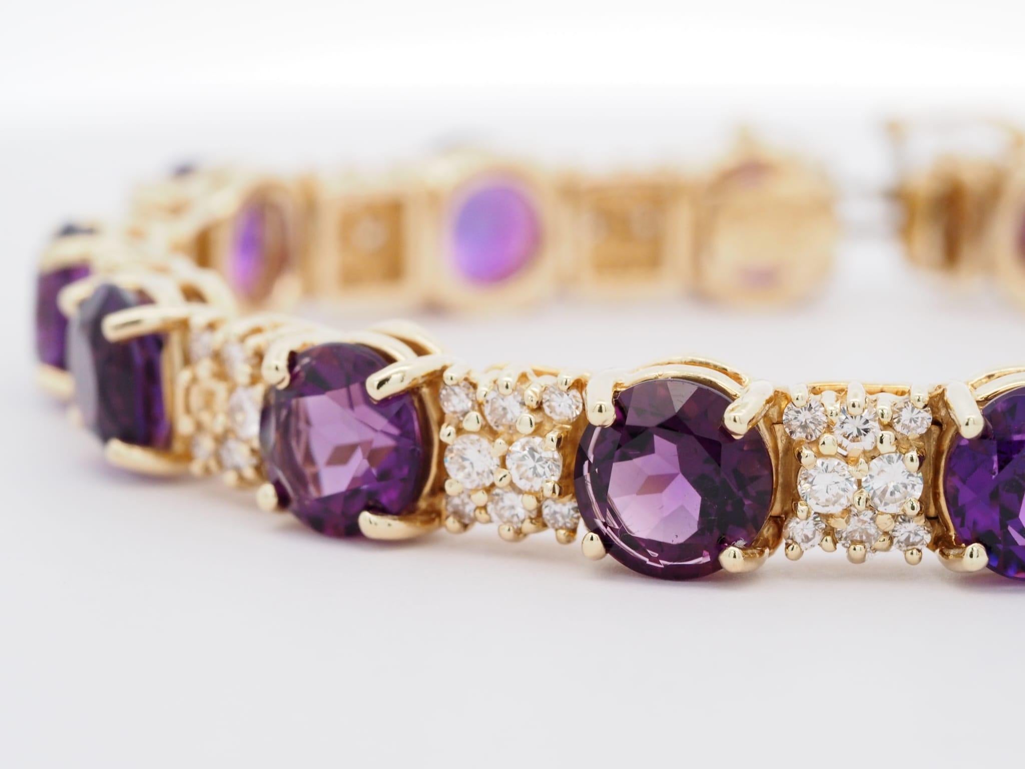 A beautiful piece of jewelry made by La Triomphe! It's an 18-karat yellow gold ring with a round-shaped Amethyst that weighs approximately 20 carat (each stone 8 x 8mm). The diamonds on the bracelet also total ~4 carat and have VS1-VS2 clarity, with