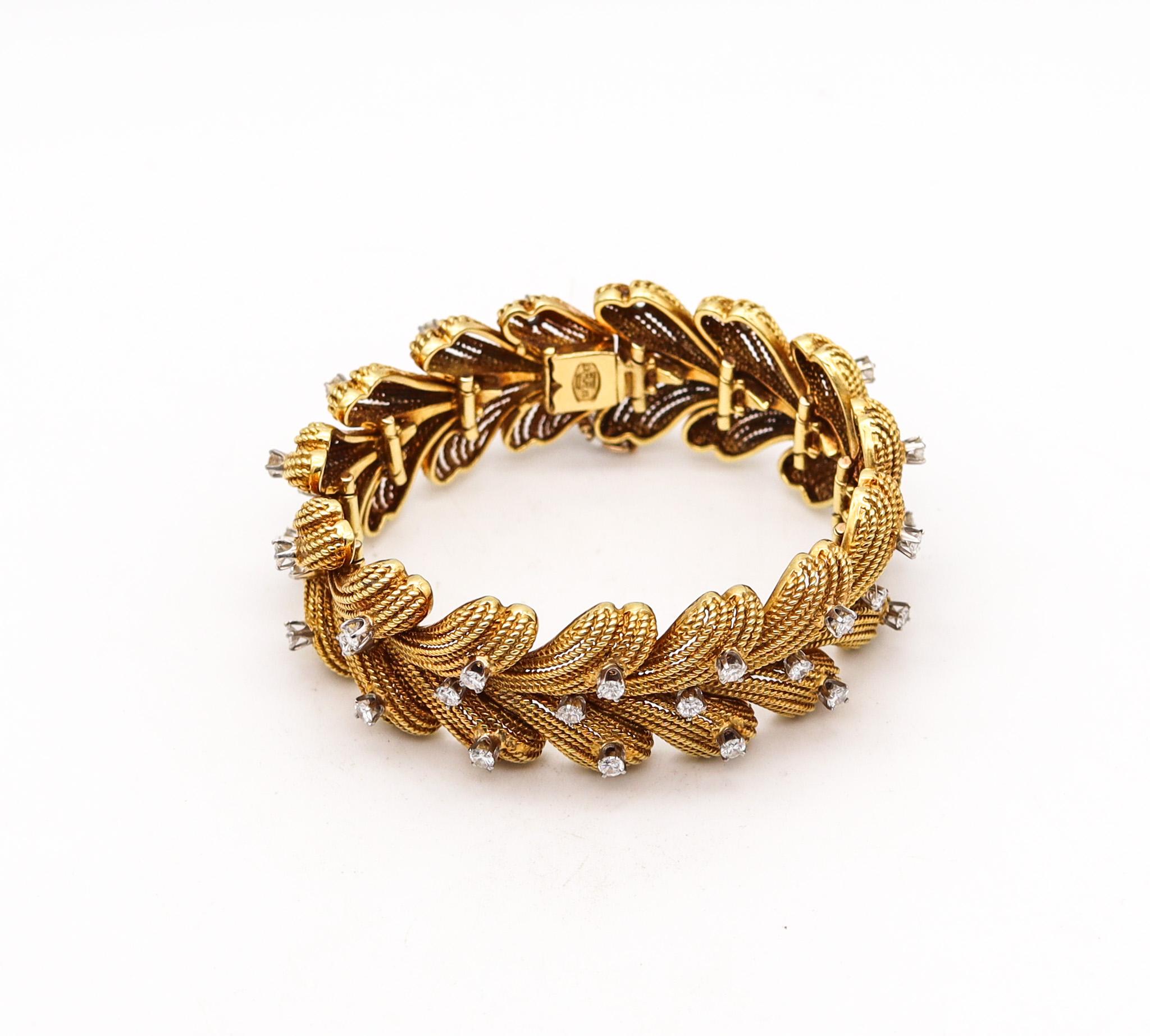 Statement diamonds bracelet designed by La Triomphe.

Beautiful retro modern bracelet, created in Astoria New York by La Triomphe, back in the early 1970. This stunning piece was carefully crafted with twisted wires made up in solid rich yellow gold