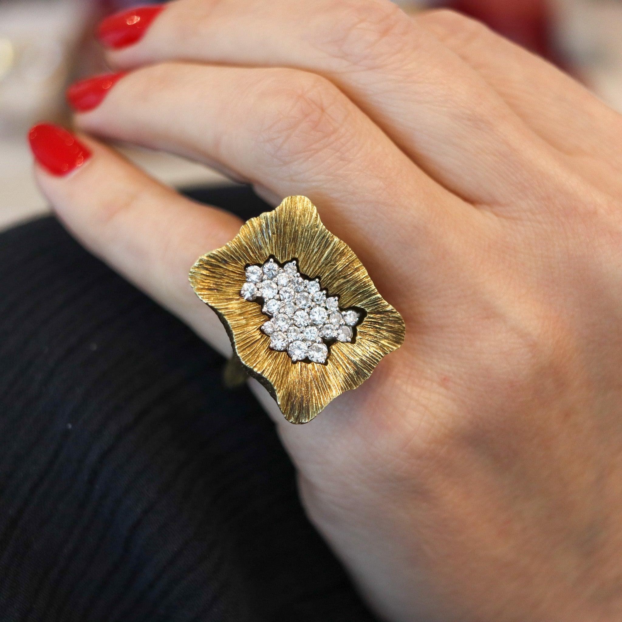 A sculptural cocktail ring designed by La Triomphe.

This is a gorgeous cocktail ring, created in Astoria New York by the jewelers of La Triomphe, back in 1970. The sculptural ring was masterfully crafted in solid yellow gold of 18 karats with