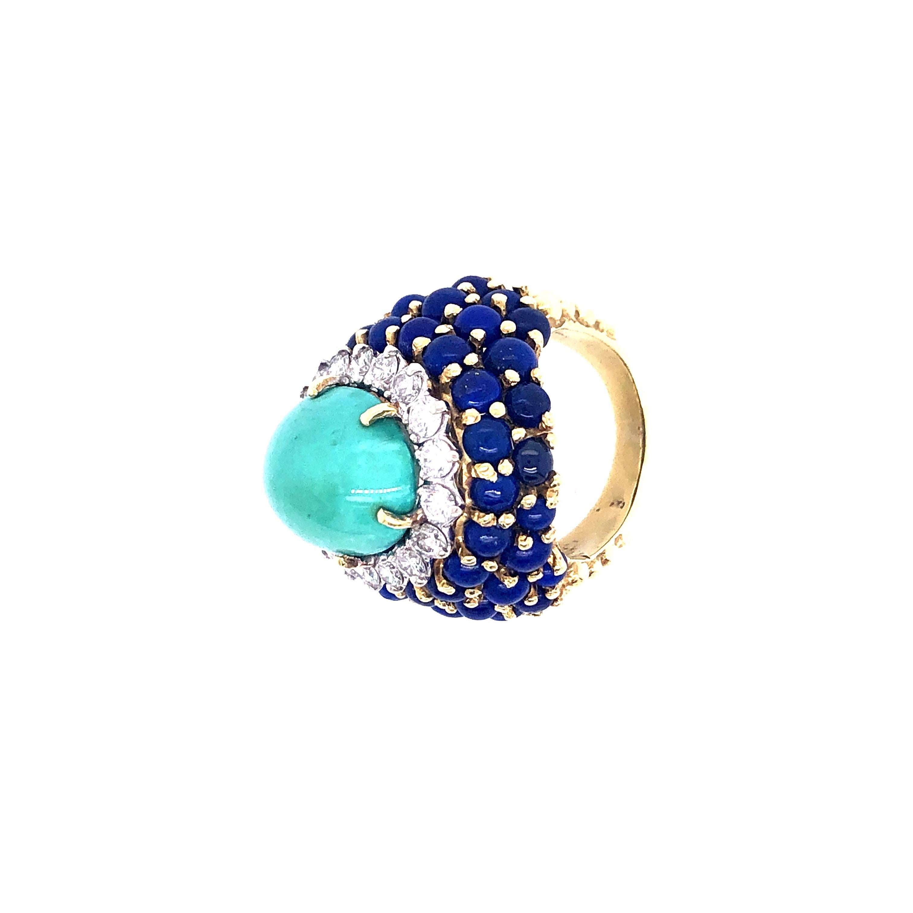 Turquoise Lapis and Diamond Ring. Size 6. Made by La Triomphe. Size 6 and can be sized. Elegant ring with a Turquoise center surrounding by round diamonds and lapis.Beading between the lapis and the shank set this piece off as a wow ring.