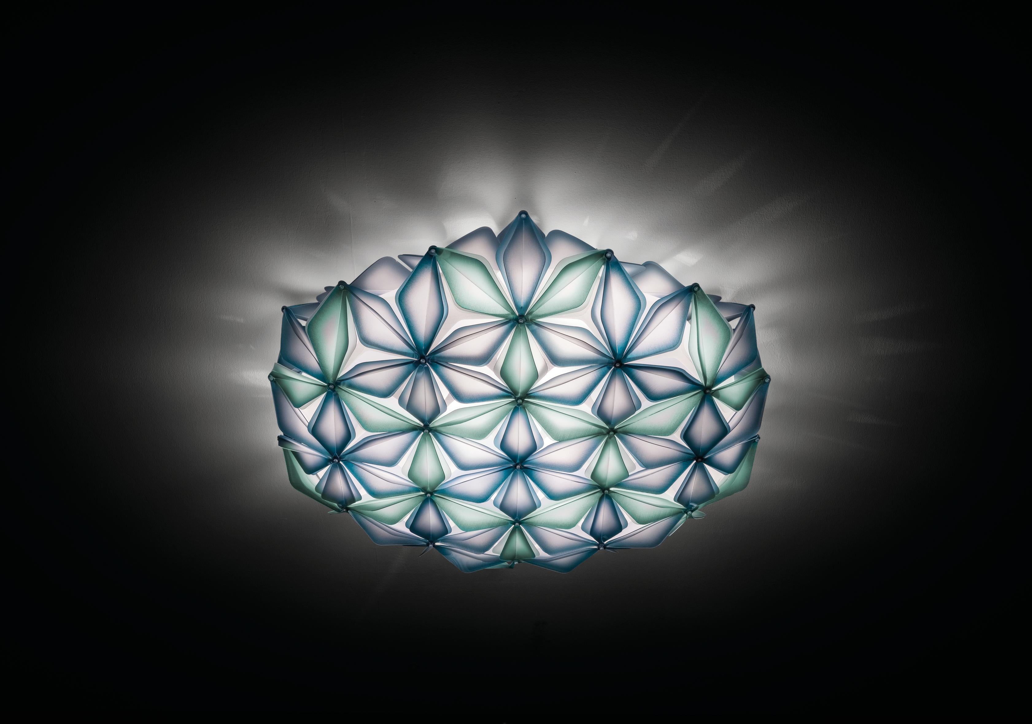 La Vie is synonymous with energy and harmony, inspired by the Flower of Life’s celebrated symbology representing the endless configurations of materials, from atoms to galaxies, contained within the universe. La Vie comes in vivacious color