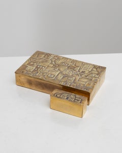 “La ville à la campagne” a set of two gilt bronze boxes by Line Vautrin