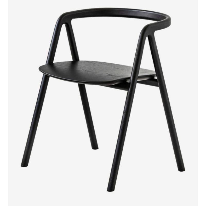 Laakso dining chair, black by made by choice with Saku Sysiö
Dimensions: 56 x 50 x 69 cm
Materials: solid ash
Finishes: natural ash / painted black

Also available in oak, upholstery category 1 (natural leather), upholstery category 2 (std.