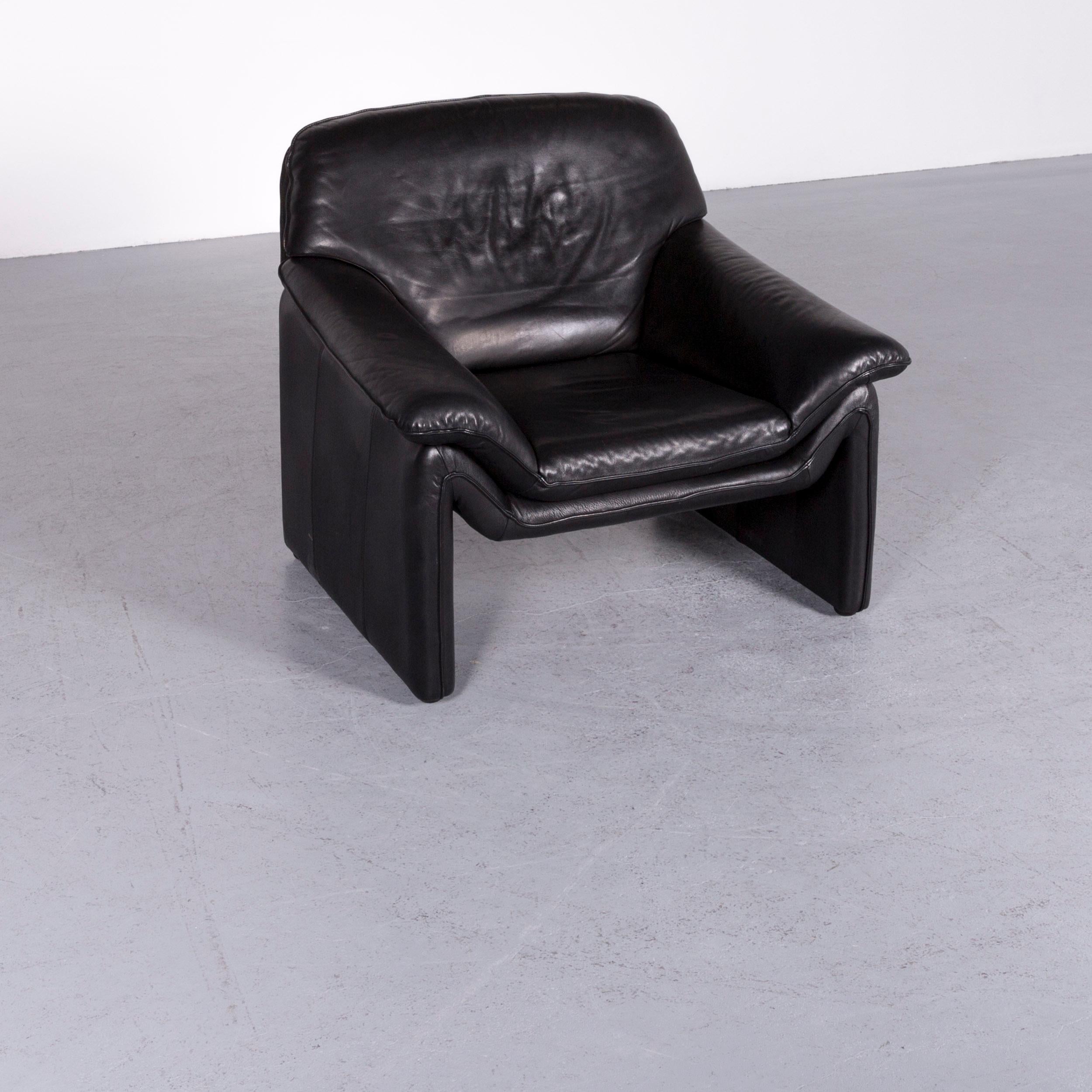 Black colored original Laauser Atlanta designer armchair leather one-seat couch modern.