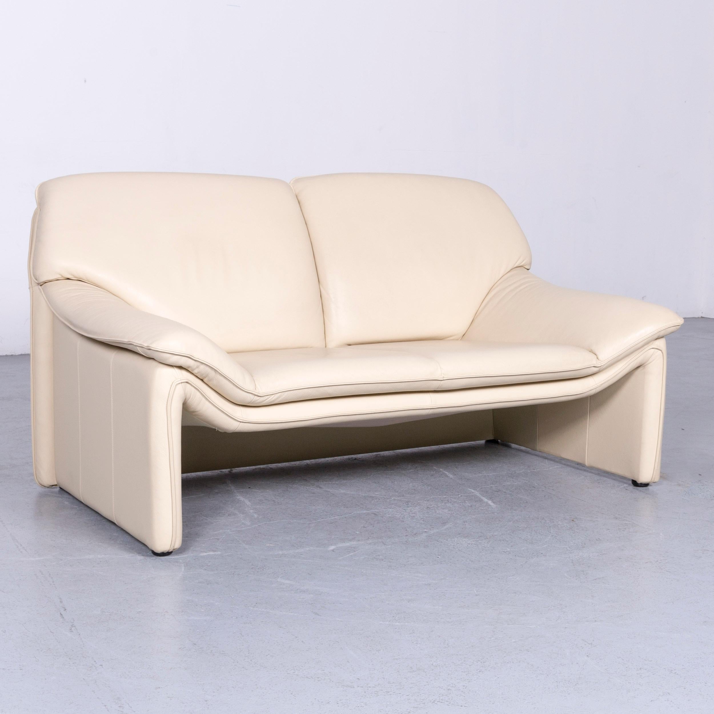 We bring to you a Laauser Atlanta designer leather sofa crème two-seat couch.