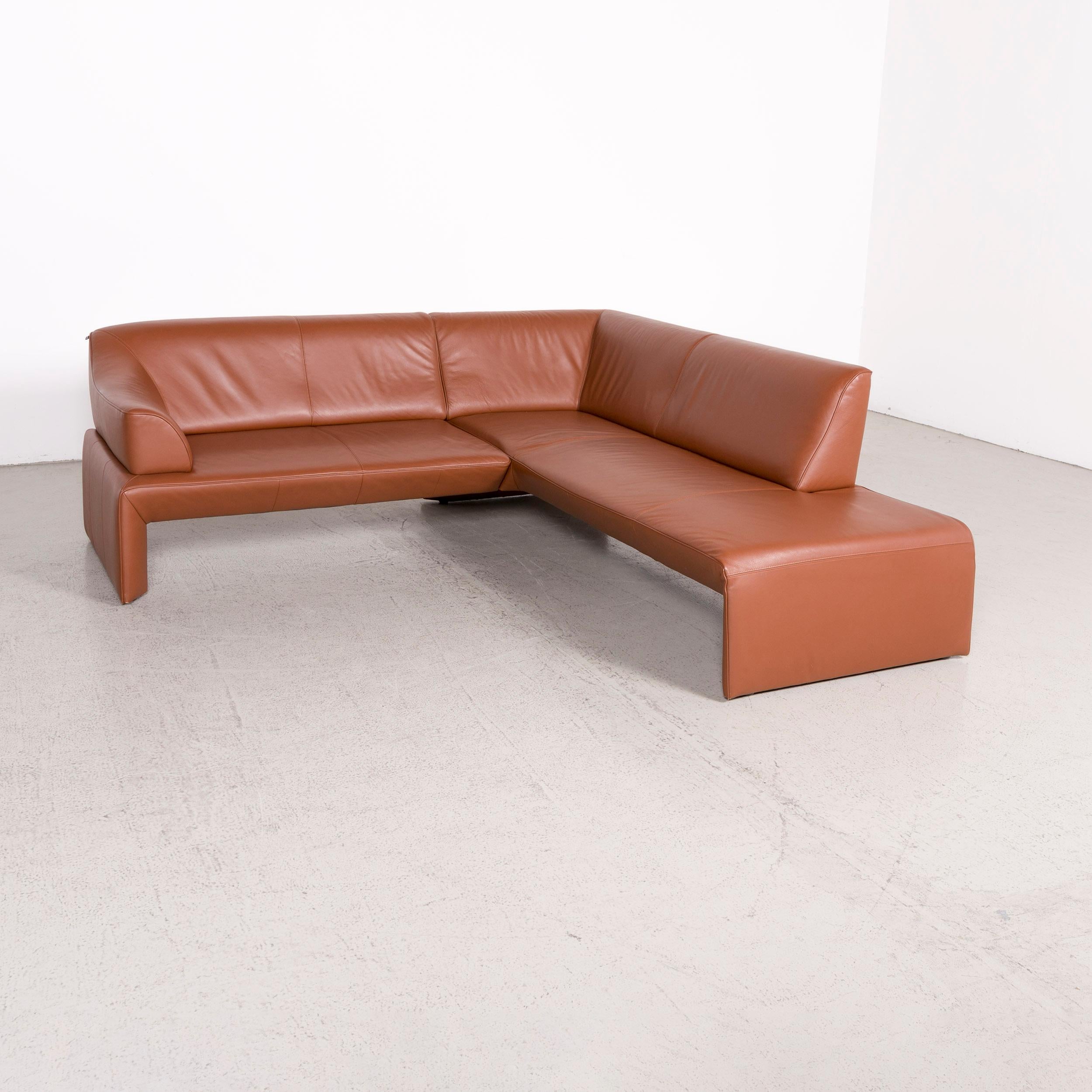 We bring to you a Laauser designer corner sofa brown cognac genuine leather sofa couch.

Product measurements in centimeters:

Depth 85
Width 215
Height 80
Seat-height 40
Rest-height 60
Seat-depth 55
Seat-width 165
Back-height 40.
 
