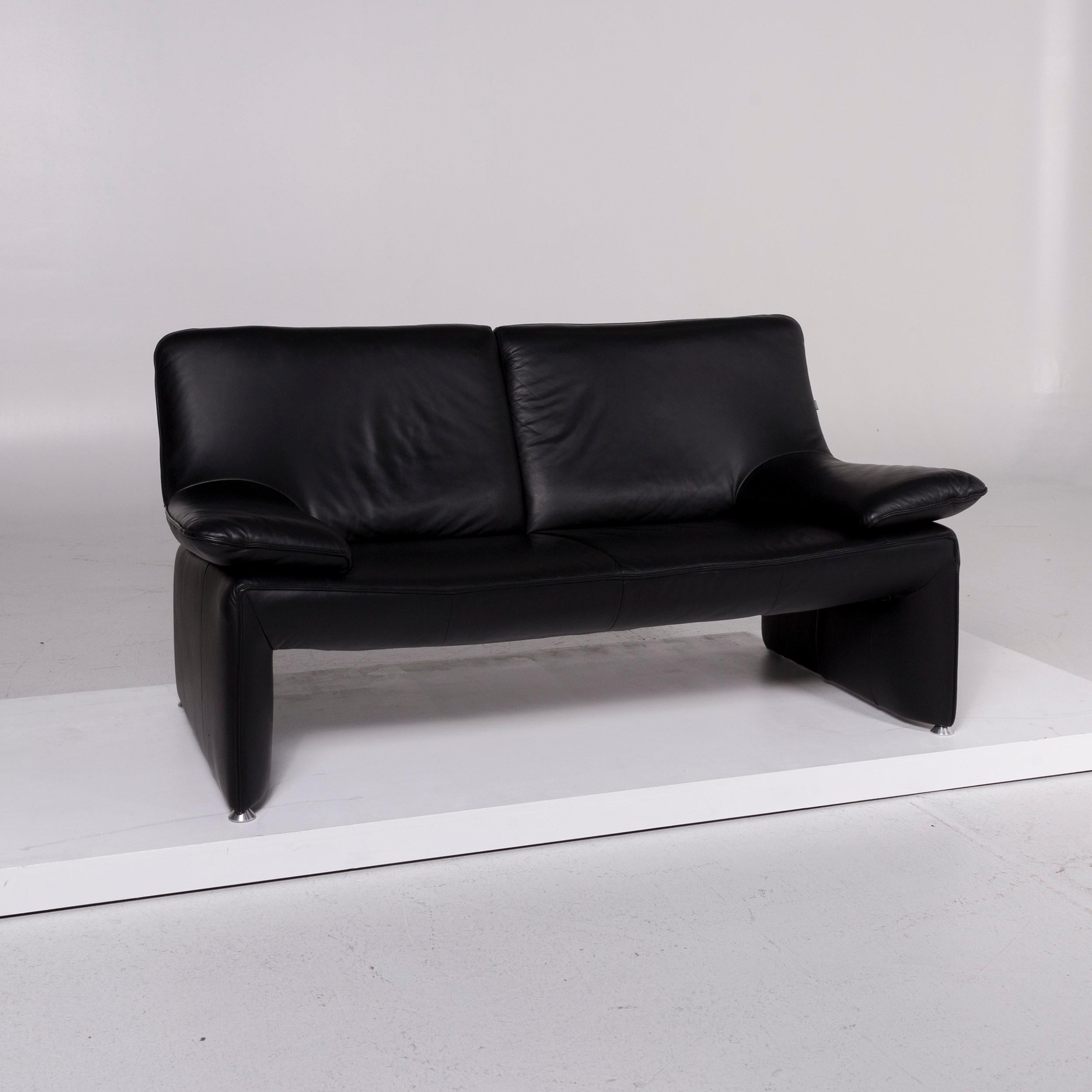 We bring to you a Laauser leather sofa black two-seat couch.
 

 Product measurements in centimeters:
 

Depth 84
Width 163
Height 83
Seat-height 42
Rest-height 52
Seat-depth 55
Seat-width 105
Back-height 44.
 