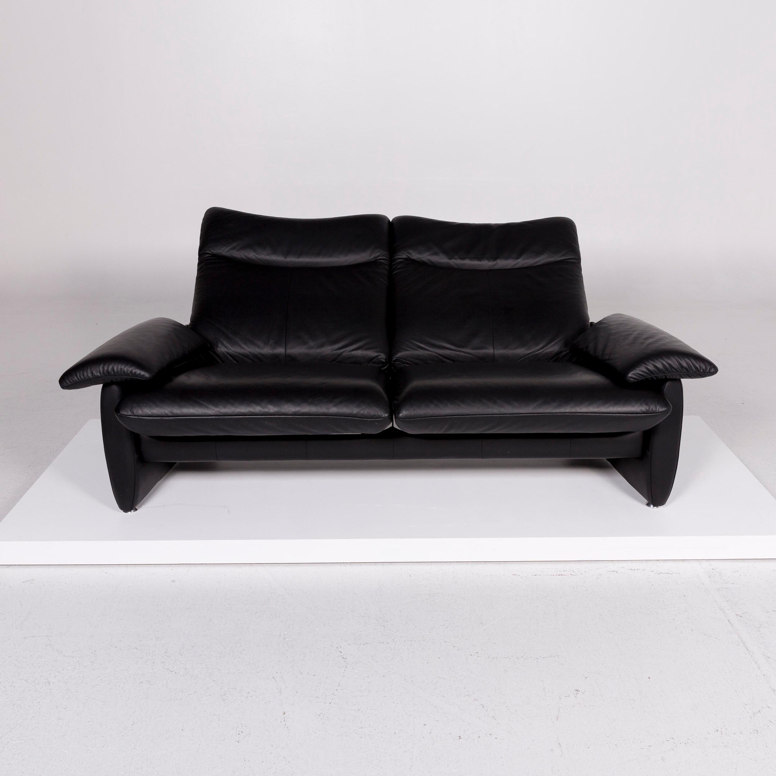 We bring to you a Laauser leather sofa black two-seat function couch.
 
Product measurements in centimeters:
 
Depth 83
Width 189
Height 72
Seat-height 43
Rest-height 56
Seat-depth 59
Seat-width 125
Back-height 30.


 