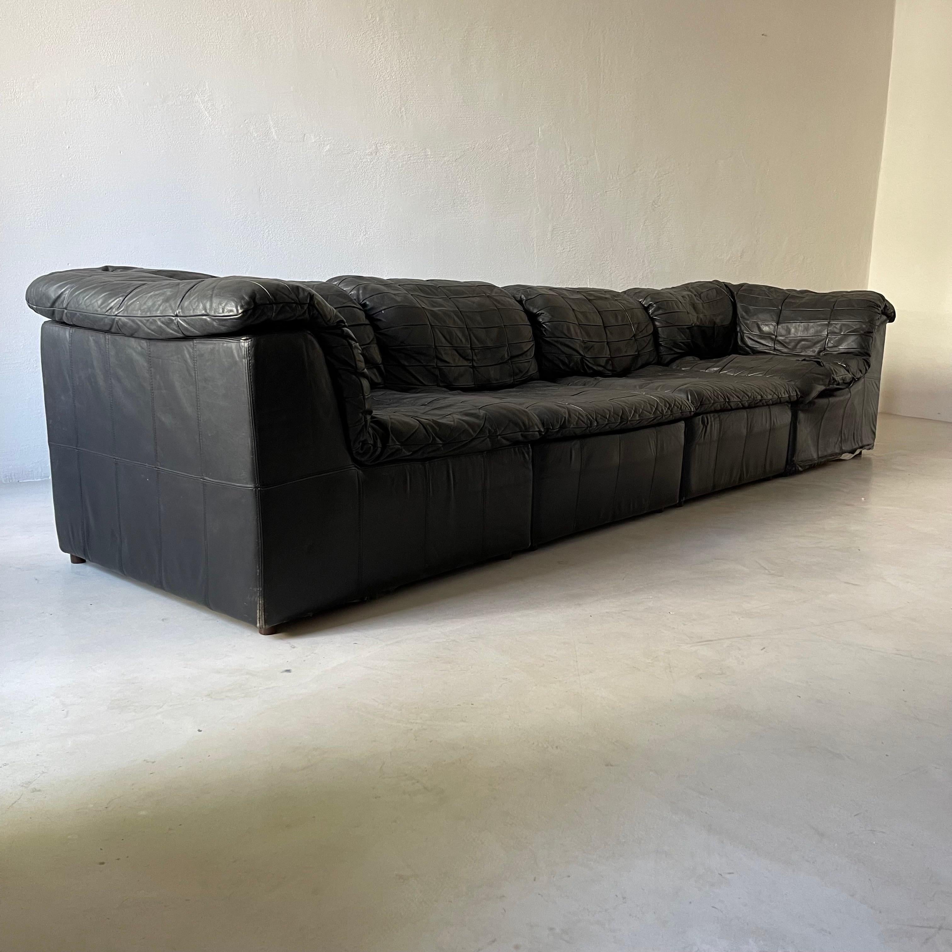 
Laauser Vintage Leather Patchwork Sectional Sofa, Germany 1970s. Very cool looking and comfy vintage Laauser Sofa, that is inspired by the most famous patchwork sofa from De-Sede: DS11. We like this vintage gem a lot, as the seating depth is a bit