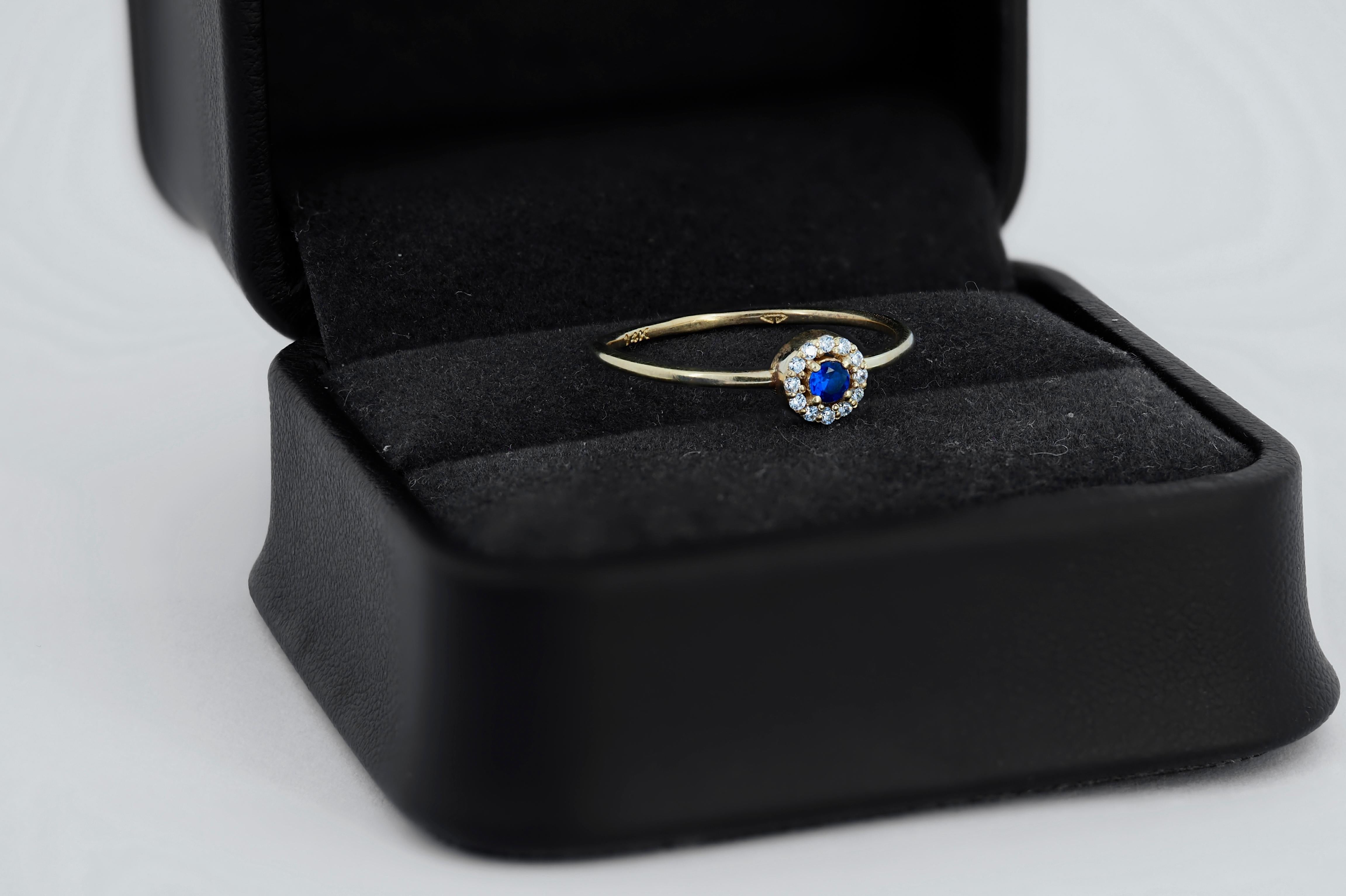 Round Cut Lab blue sapphire, moissanites halo 14k gold ring.