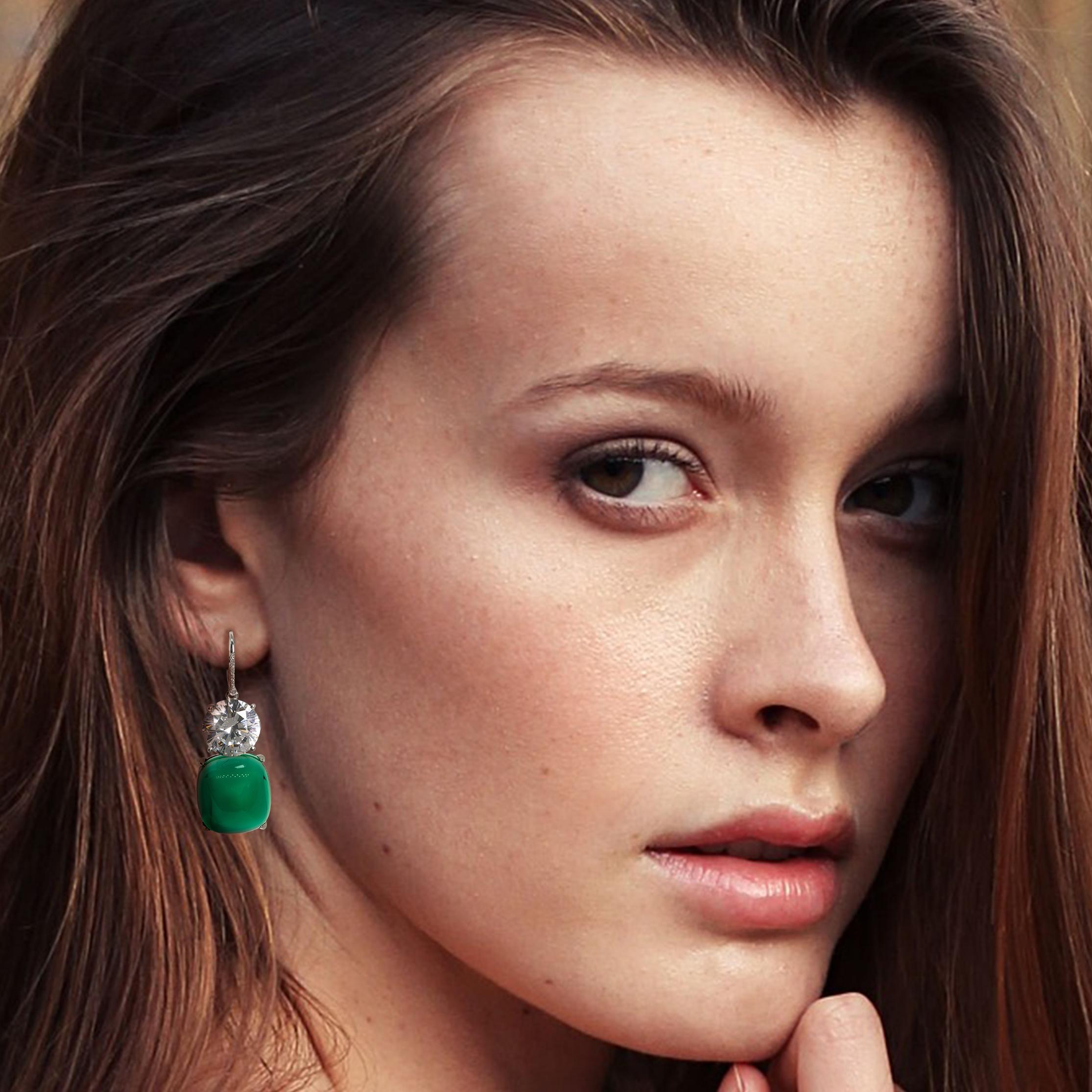 Lab Created Diamond Costume Jewelry Large Cabochon Emerald Earrings

Our stunning faux large cabochon emerald and large round diamond CZ with genuine tiny diamond set-tops are the most breathtaking Red Carpet look in the classic estate-signed