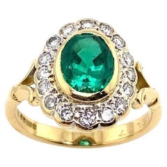 Lab Created Oval 1.77ct Emerald Ring, in 16 Diamonds in 18ct Yellow Gold
