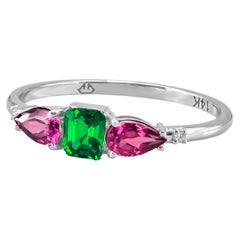 Lab emerald, garnet 14k gold ring.