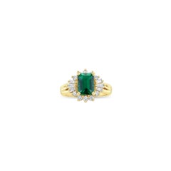 Lab Generated Emerald with Diamond Halo Engagement Ring