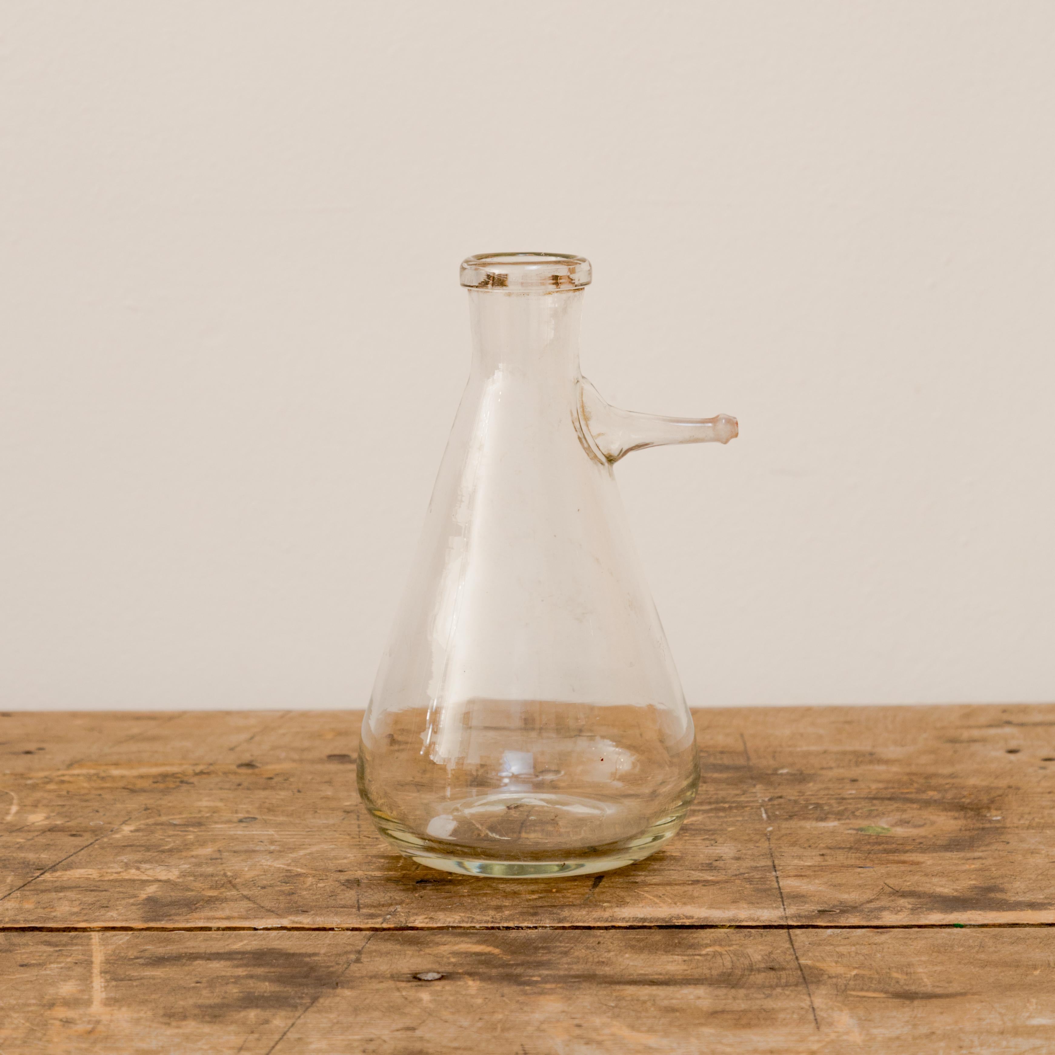 Beaker shaped vintage lab glass mini beaker vessel with spout.