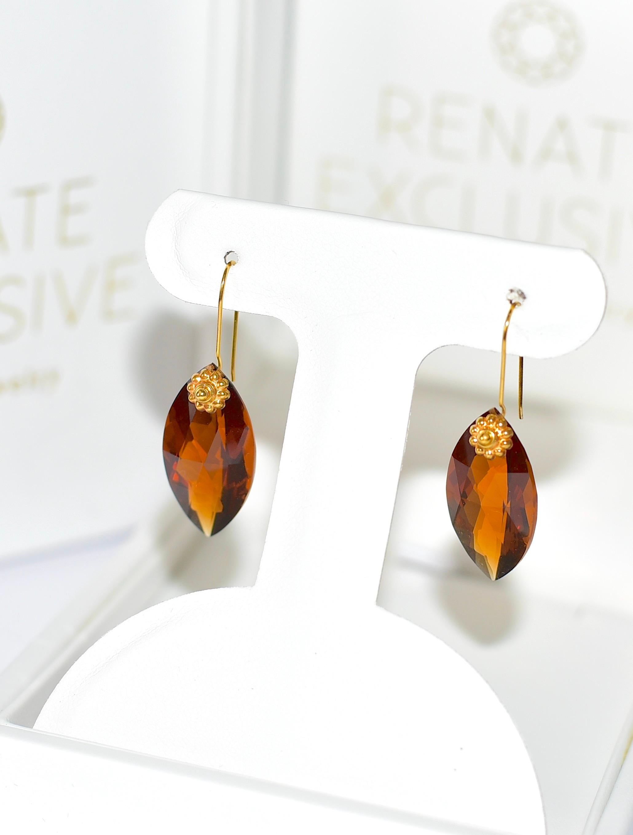 Simple lab-made Madeira Citrine earrings in fall tones. 
Wonderful and shiny, deep brown color. 
Total length 1.60 inches (4.064 cm )
Madeira Citrine Marquise Checker 29.65CT

Simple and everyday earrings at a good price!
The 18K solid Yellow Gold