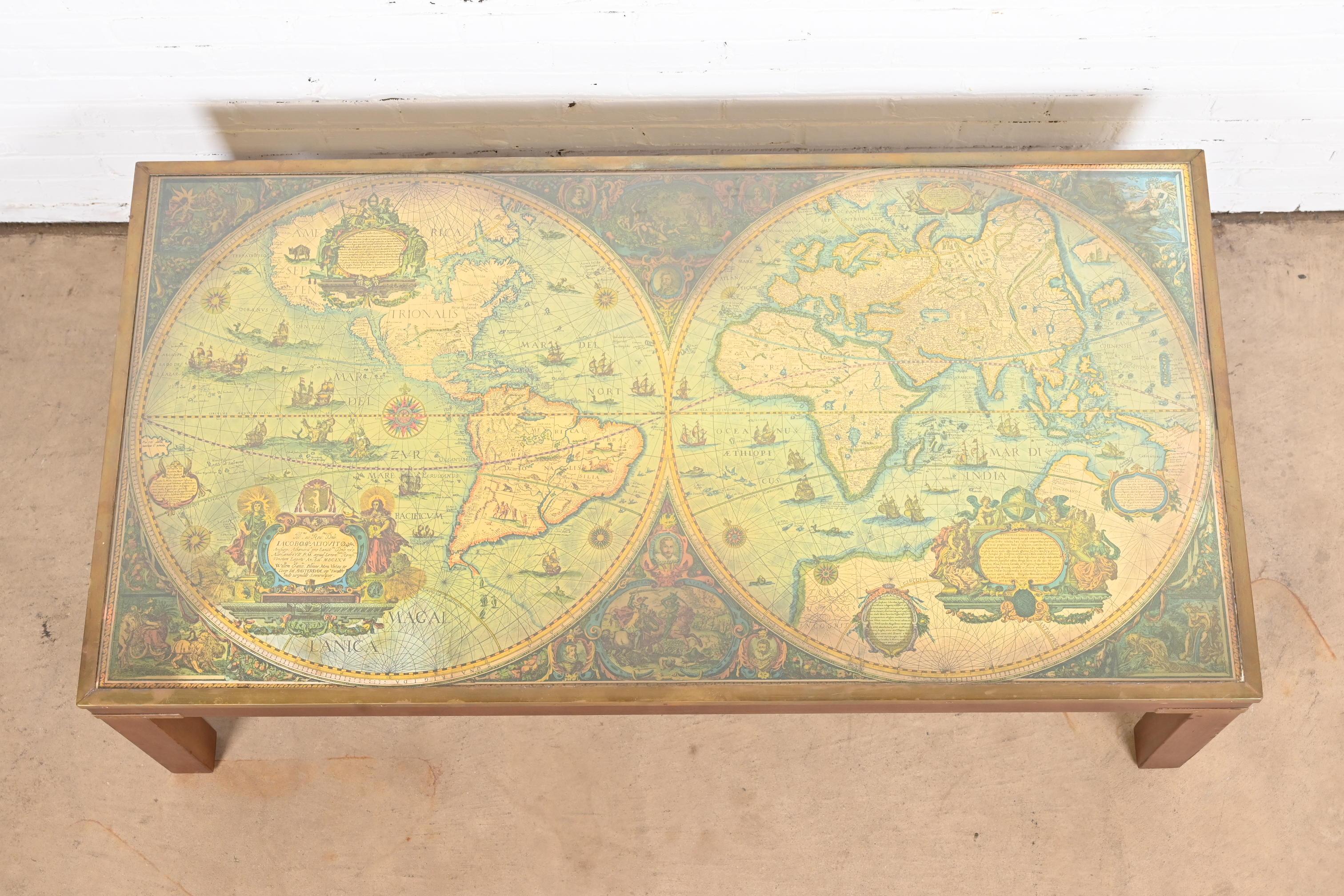 A gorgeous mid-century Campaign style coffee or cocktail table

By LaBarge

USA, 1960s

Brass mounted mahogany, with old world map under a glass top.

Measures: 52.25