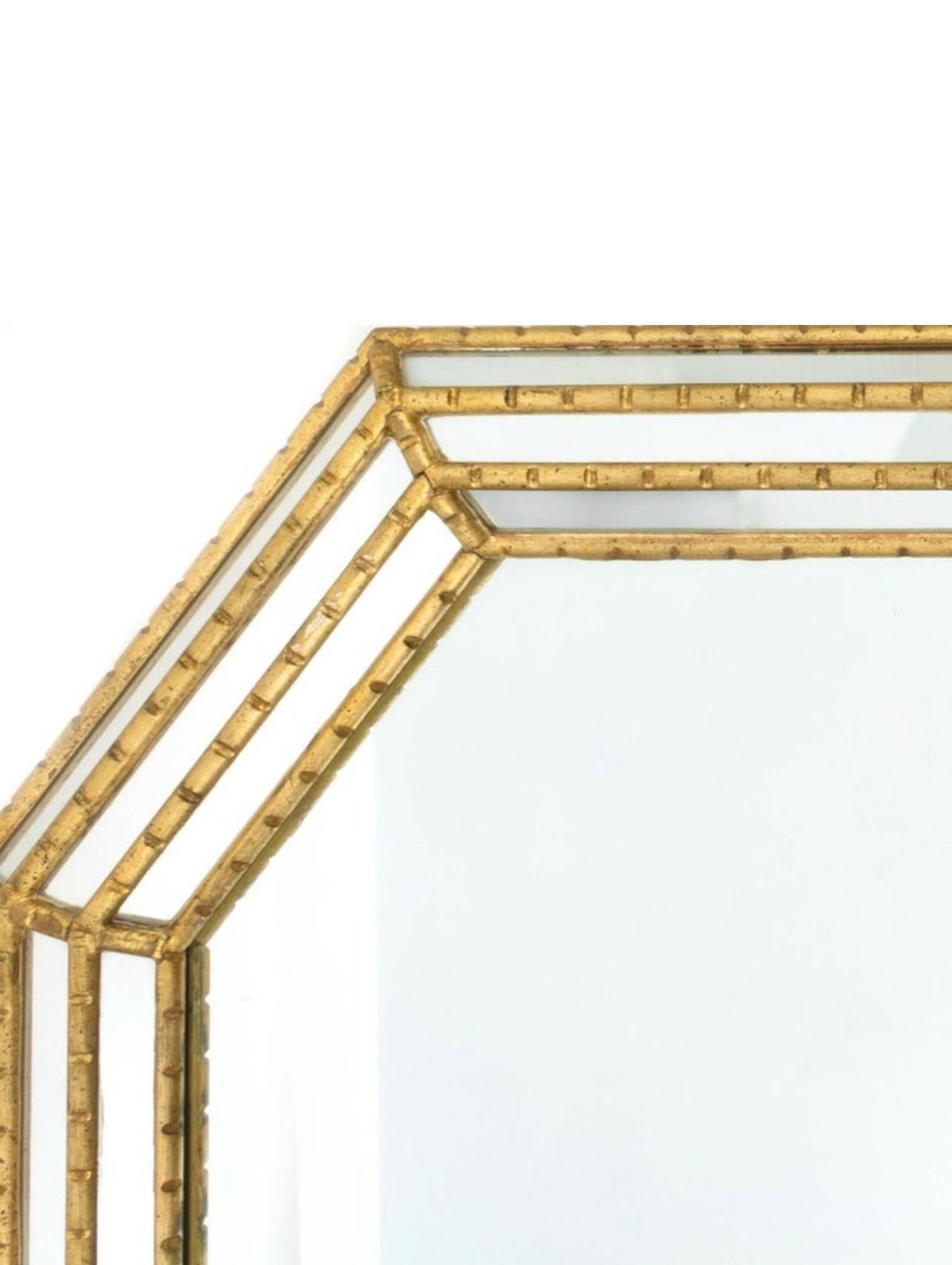 Gold octagon framed mirror with faux bamboo frame and inset mirrored panels by Labarge. 

USA, circa 1980.

Dimensions: 42 inches H × W 31.5 inches W.