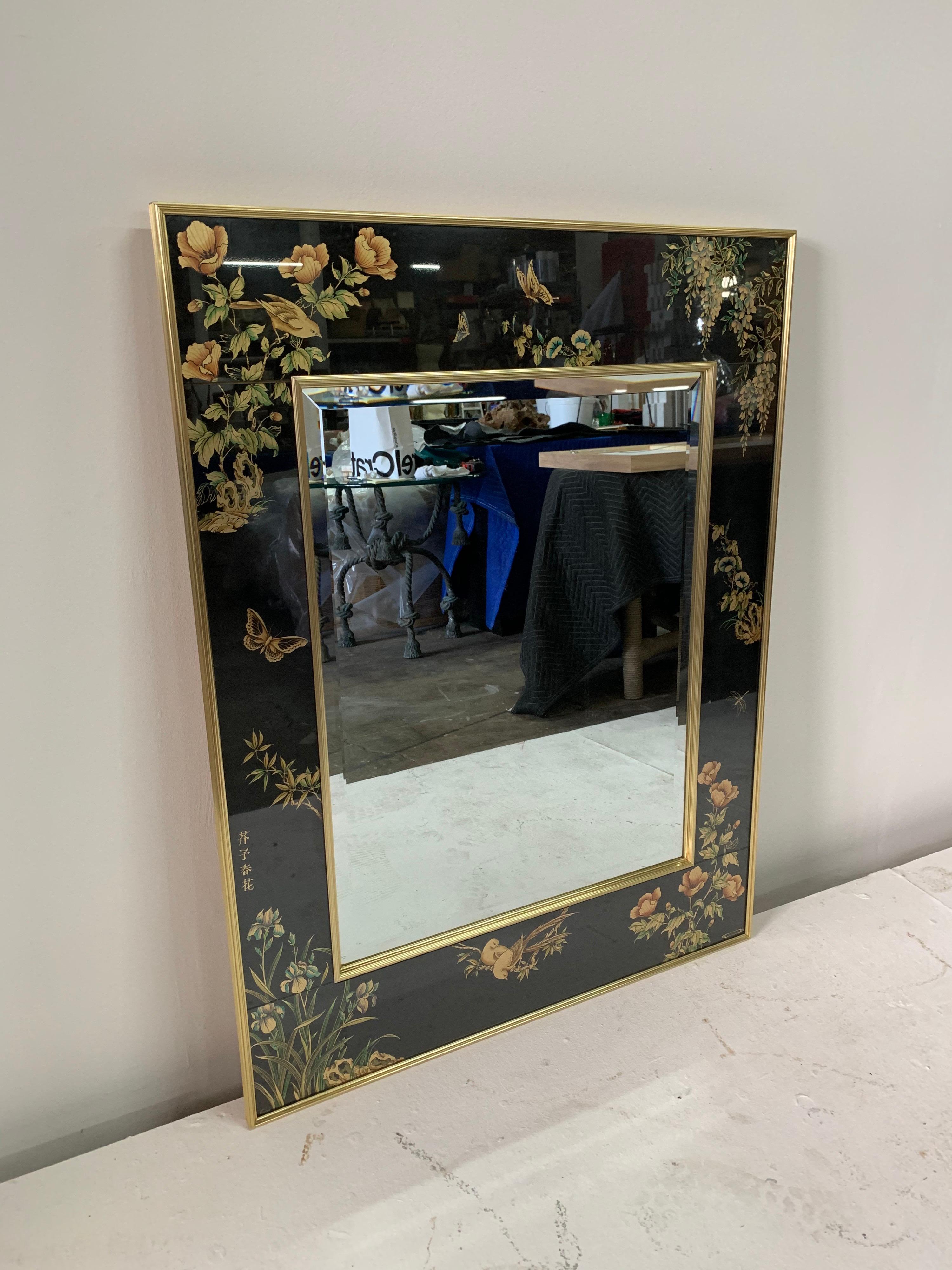 Elegant hand painted on glass framed beveled mirror by LaBarge. The signature on lower right DREID '81. The reverse hand painted on glass frame with beveled interior mirror with gilt aluminum outside frame. Exceptional original condition.