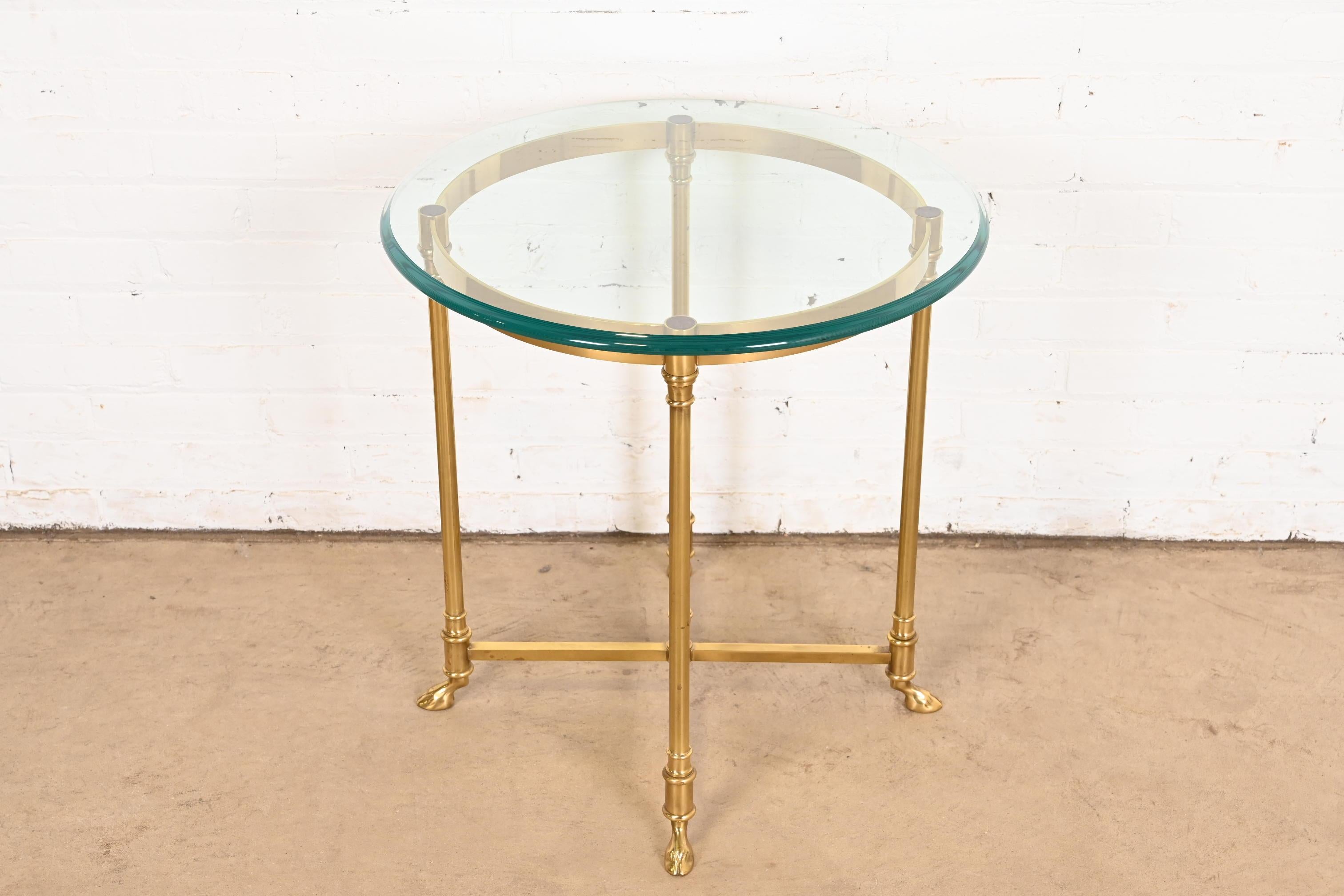 A gorgeous Mid-Century Modern Hollywood Regency hooved feet side table

By Labarge

Italy, Circa 1960s

Solid brass frame, with beveled glass top.

Measures: 23.5