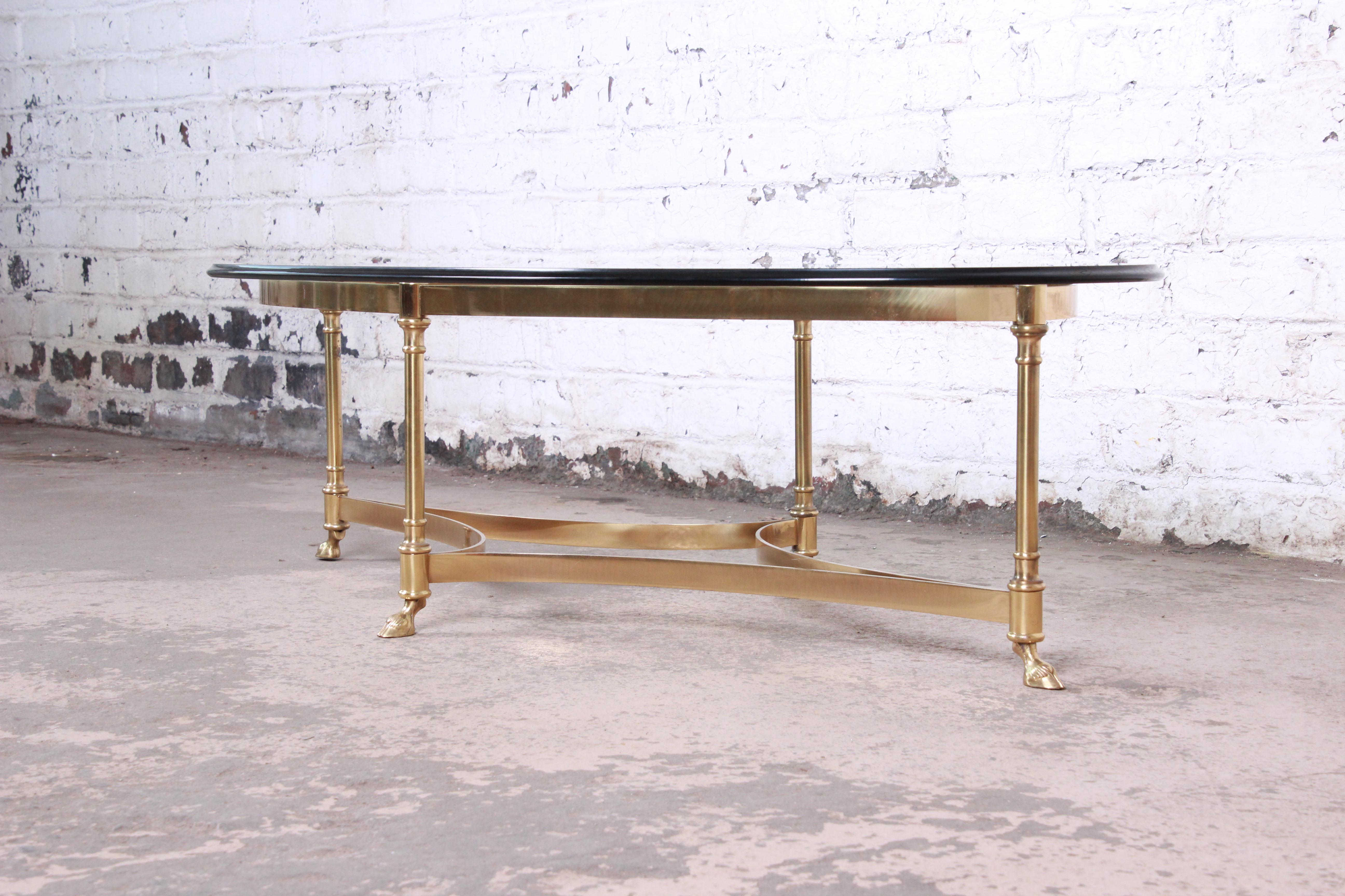 Labarge Midcentury Hollywood Regency Brass and Glass Hooved Feet Coffee Table In Good Condition In South Bend, IN