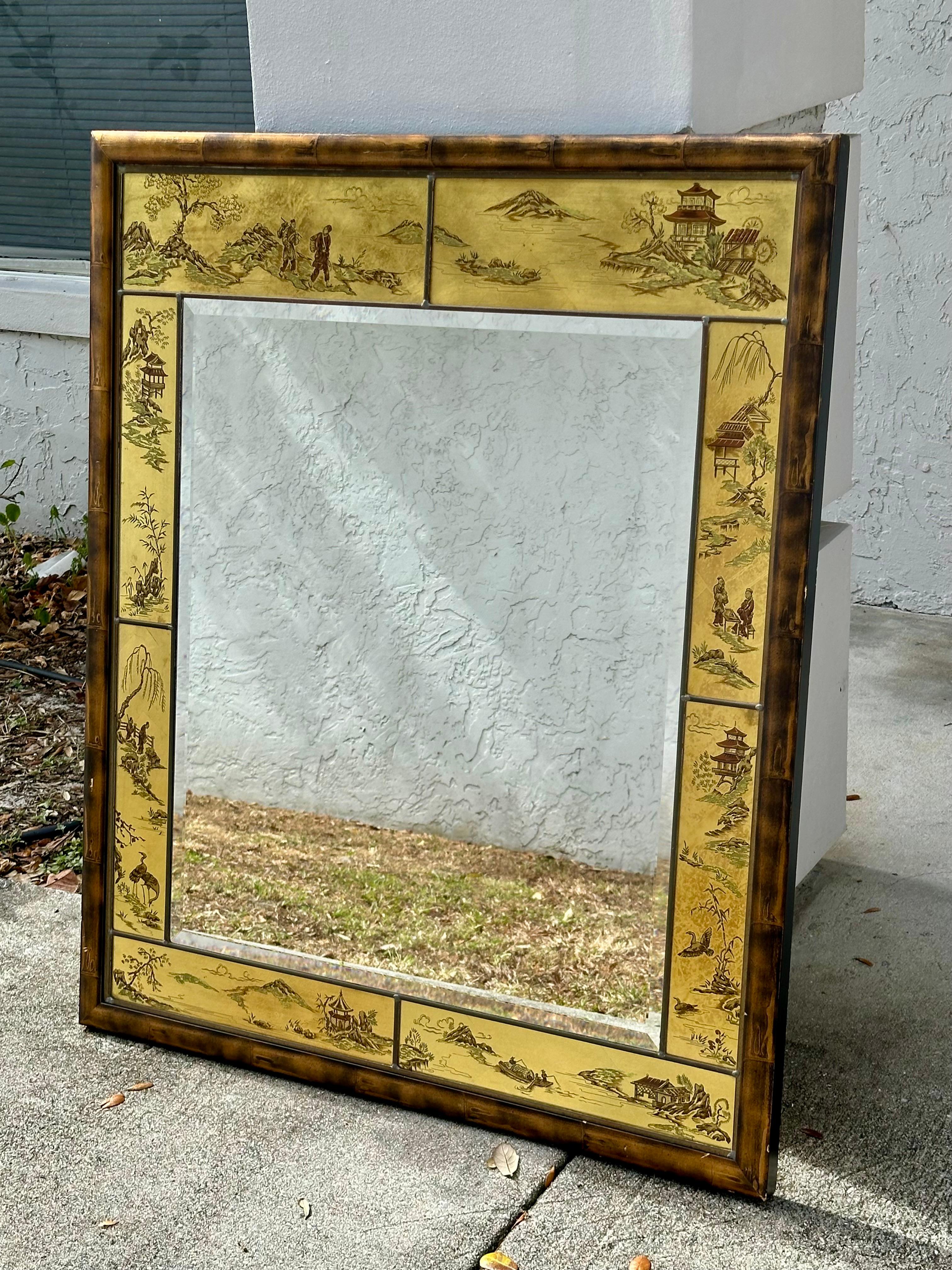 LaBarge Reverse Painted gold leaf Chinoiserie Mirror in a custom faux bamboo frame with decorated backround with Asian natural scenes.