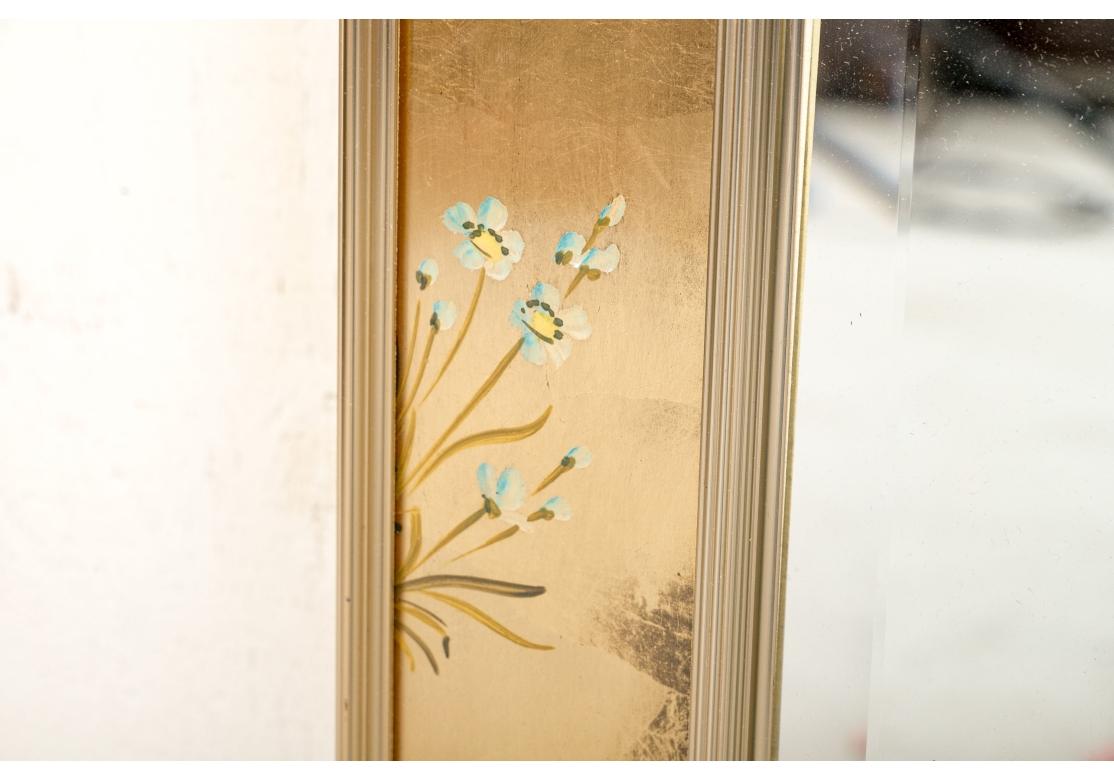 LaBarge eglomise mirror with a chinoiserie design featuring flowers, figures, butterflies and landscapes. The mirror with a brass trim and beveled glass.
Signed lower right.

Dimensions: 42.25