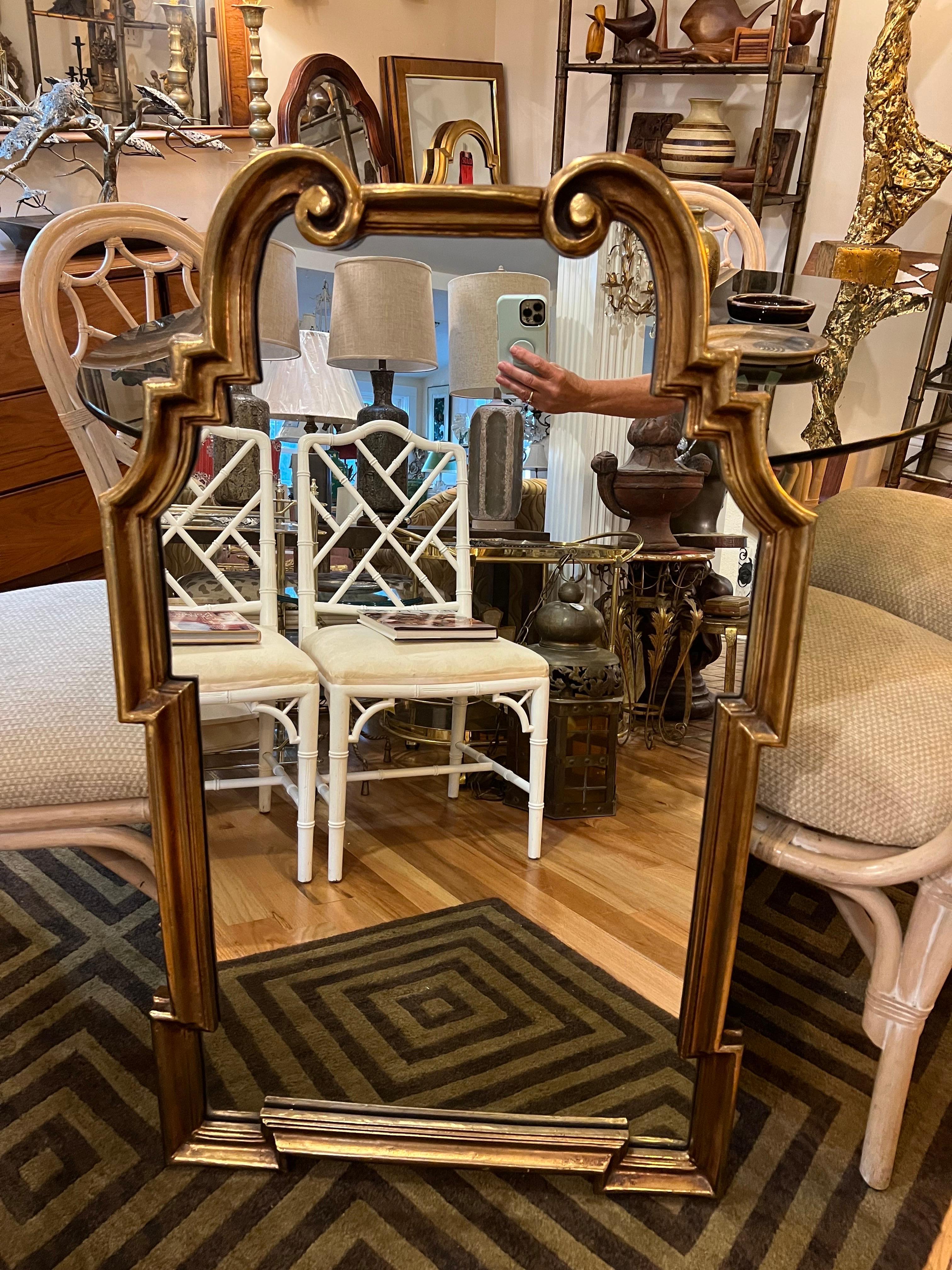 Classic LaBarge style mirror. Signed no 3067. On top, Classic shape and heavy solid piece. Possibly made out of Composition. Perfect for an entry way or over a vanity.