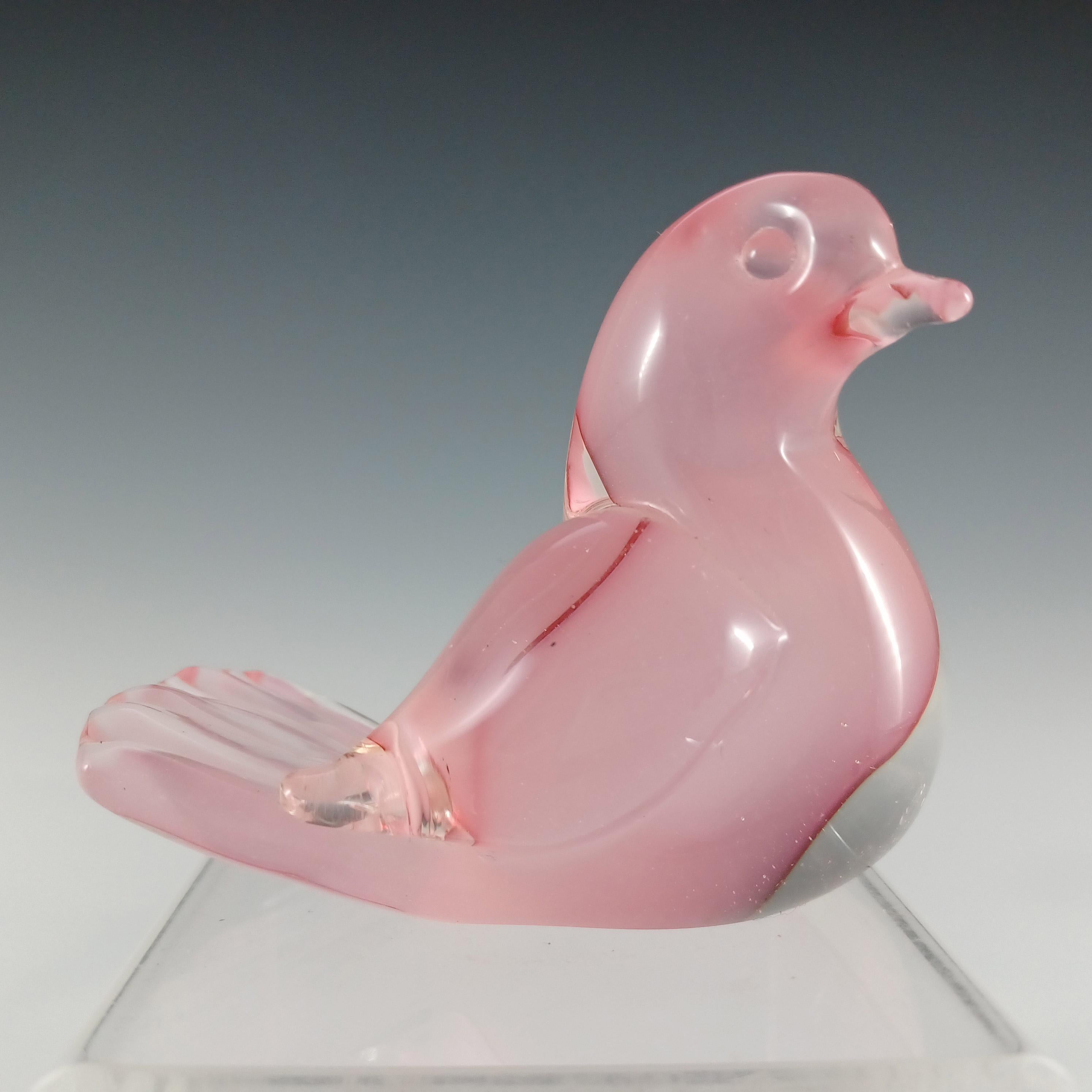 Here is a wonderful Venetian pink & clear cased glass bird sculpture, made on the island of Murano, near Venice, Italy. Made by the Oball glass factory, and still bears the original label (worn).

Please note: the plastic stand is for display