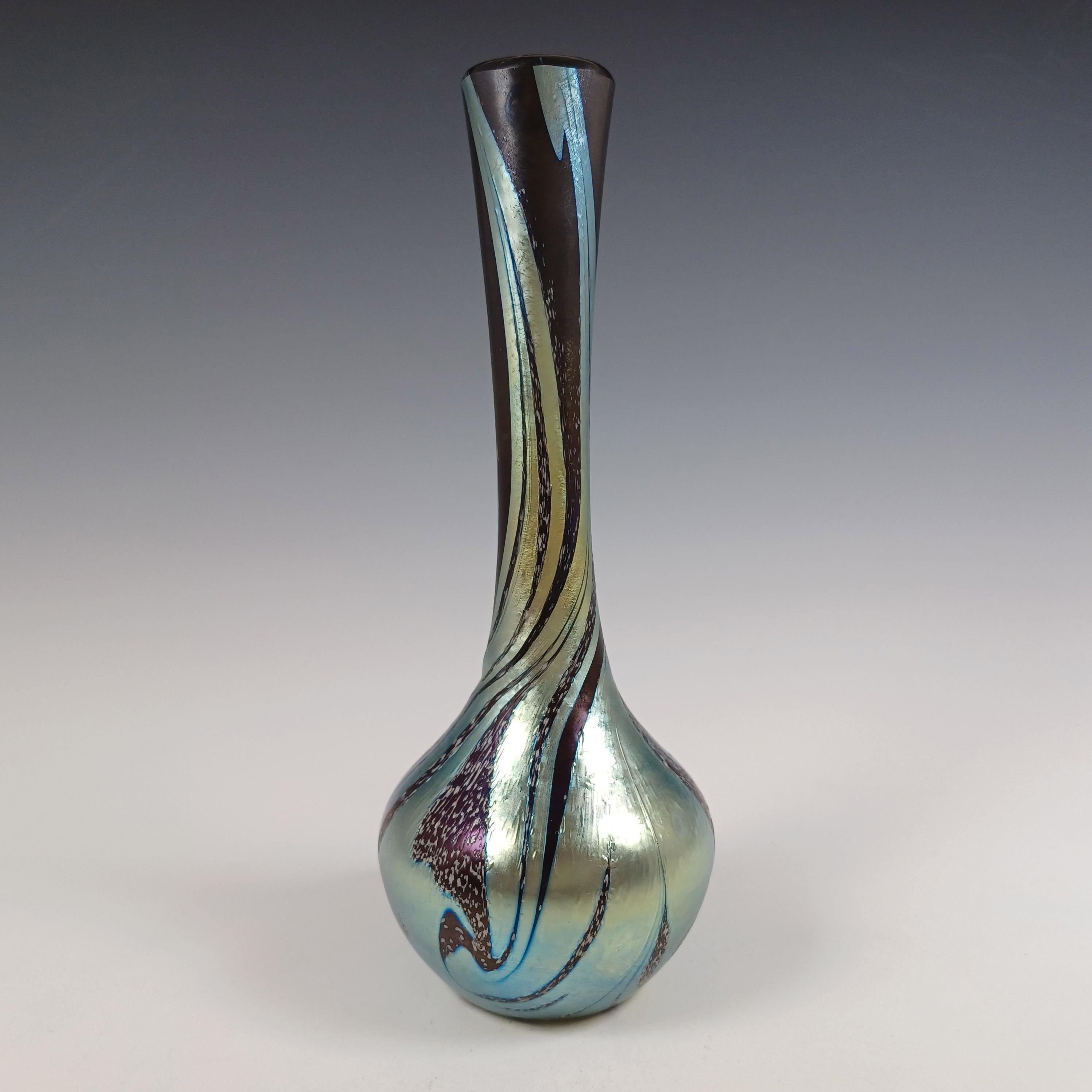 A beautiful black and silver glass vase with iridescent finish. Made by Okra, part of the 