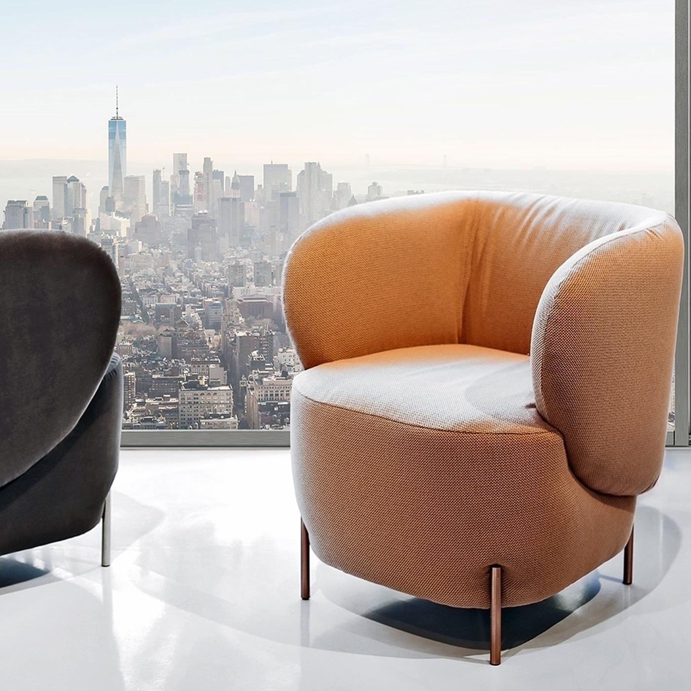 LaBimba is an upholstered indoor armchair. The Italian name means 