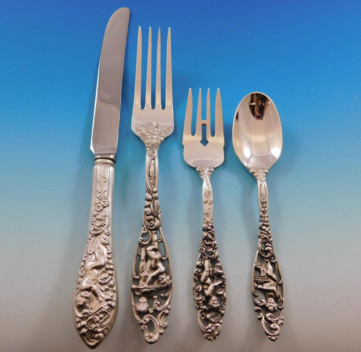 Outstanding sinner size labors of Cupid by Dominick and Haff sterling silver flatware set, 54 pieces. This set includes:

12 dinner size knives, 9 3/4