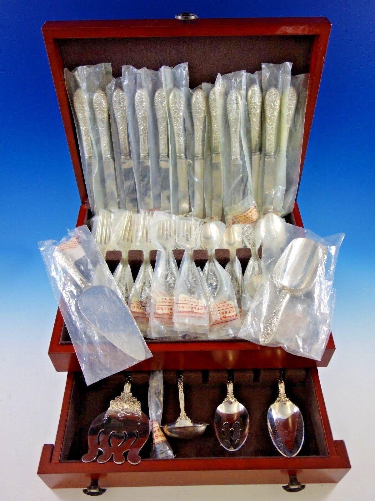 Labors of Cupid by Dominick and Haff sterling silver dinner size flatware set - 65 pieces. This set includes:

12 dinner size knives, 9 3/4