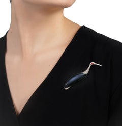 Broche cigüeña de labradorita y diamantes