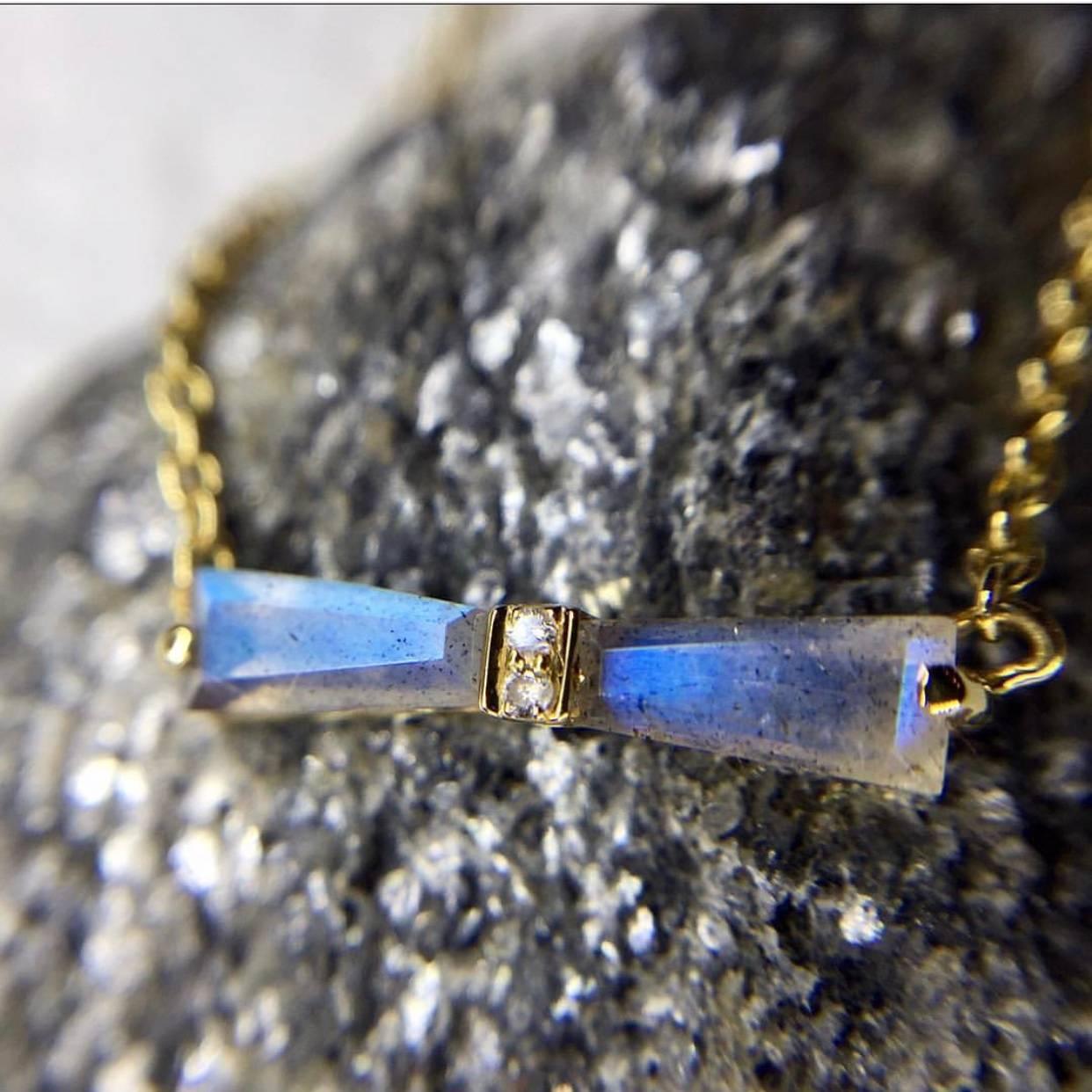 labradorite and diamond tapered baguette bow station necklace set in 18k yellow gold. 
Each piece of jewelry is handmade to order for you.  Production time is 4-6 weeks.  Customization of gold color, stones and sizing is possible and encouraged. We