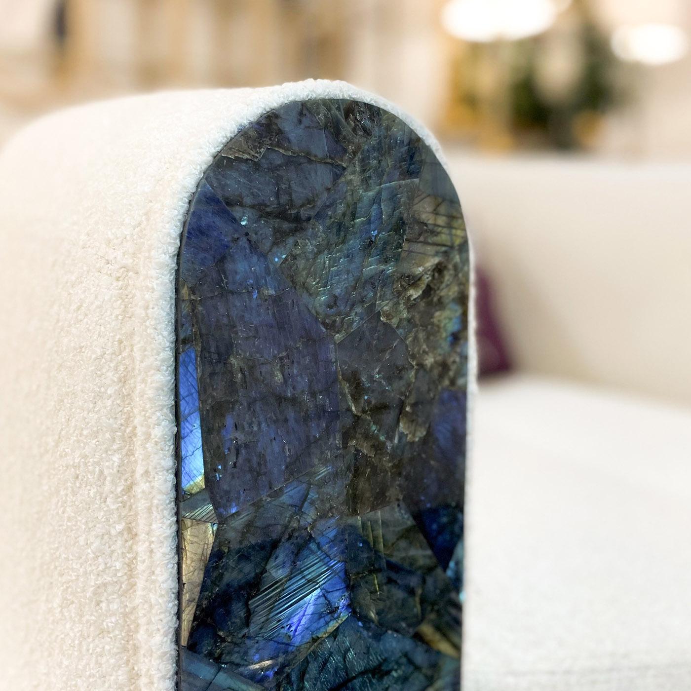 Exceptional comfort and refinement flawlessly combine in this spectacular armchair, making it an exclusive accent piece for a lavish living area. Distinguished by magnificent Labradorite inserts, it is handmade of wood upholstered with white fabric