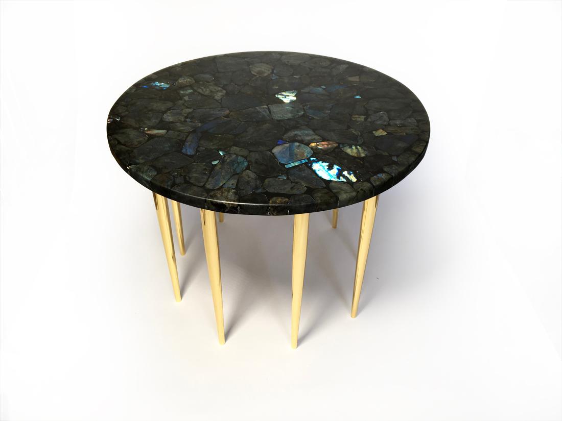 Coffee table with circular top in Labradorite and with nine brass legs designed by Studio Superego for Superego Editions, in 2018. Unique piece.

Biography
Superego Editions were born in 2006, performing a constant activity of research in decorative