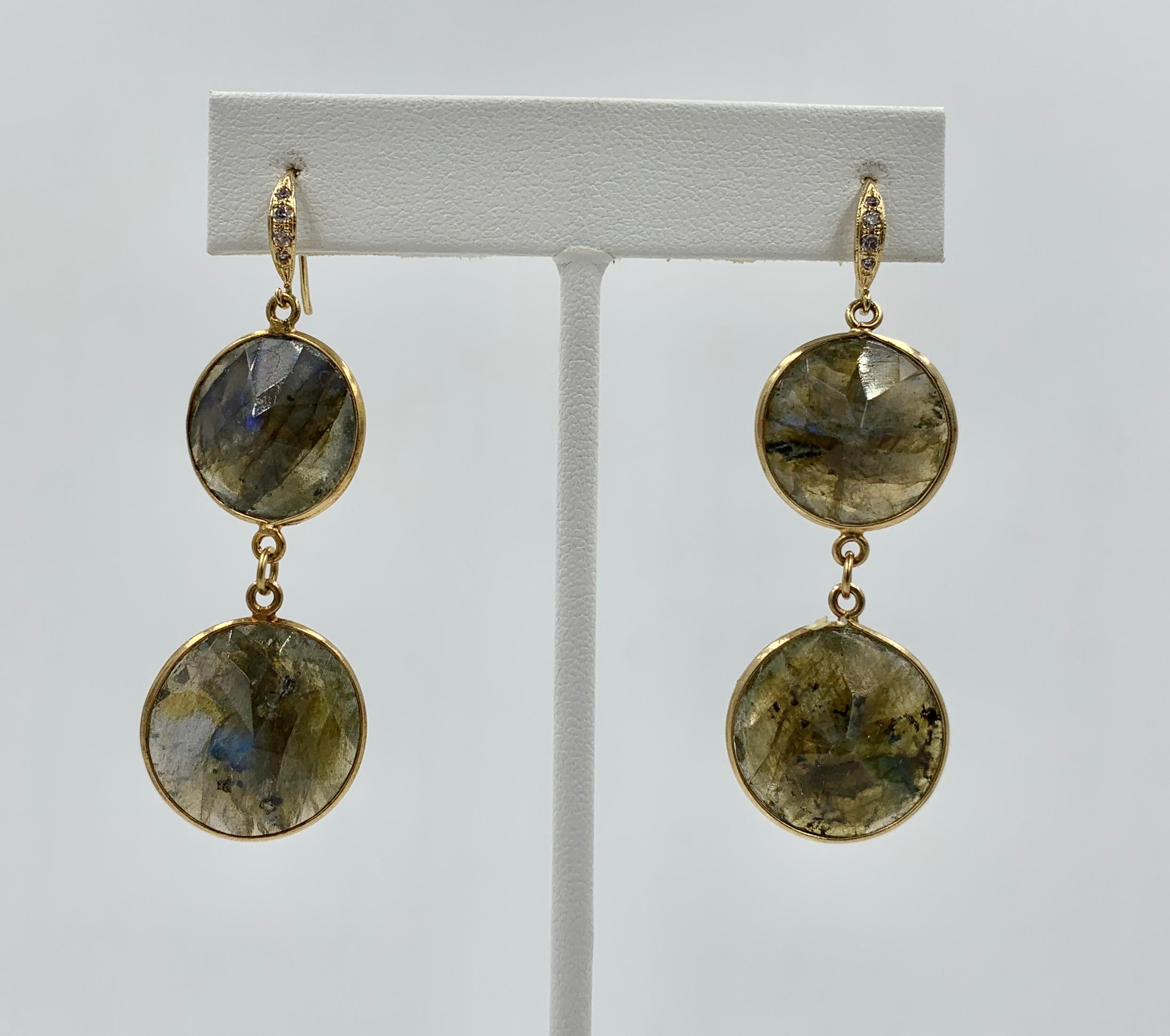 A STUNNING PAIR OF FACETED LABRADORITE DROP DANGLE PENDANT EARRINGS OF 2 1/8 INCHES IN LENGTH WITH DIAMOND ACCENTS AT THE TOP.  THE LABRADORITE IS SET IN 10 KARAT GOLD.  THE DIAMOND SET HOOKS ARE STERLING SILVER WITH A GOLD WASH.  THE EARRINGS ARE