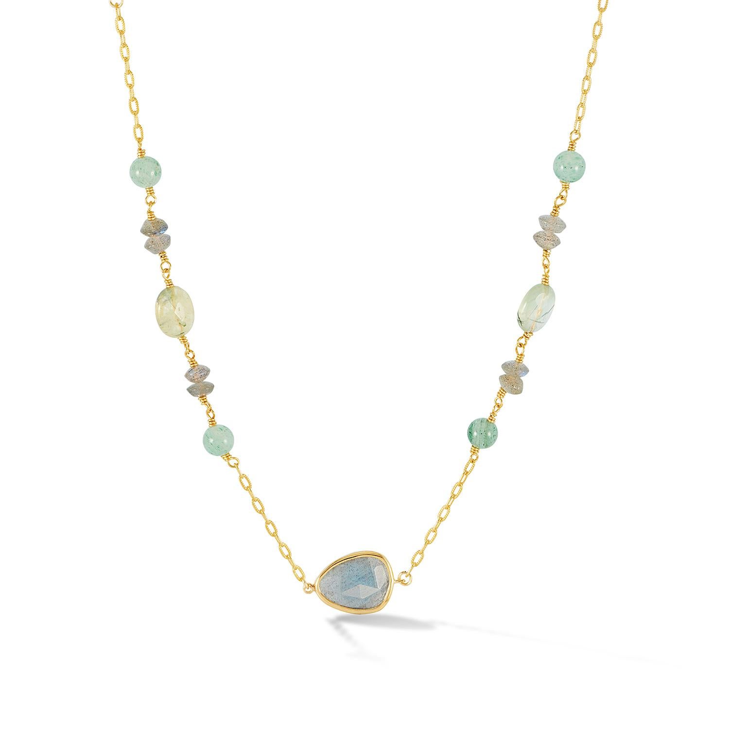Elevate your style with this stunning handcrafted Array necklace. This design features a striking grey and green arrangement of Labradorite, Prehnite and Agate gemstones, carefully threaded by hand in our London studio for a truly one-of-a-kind