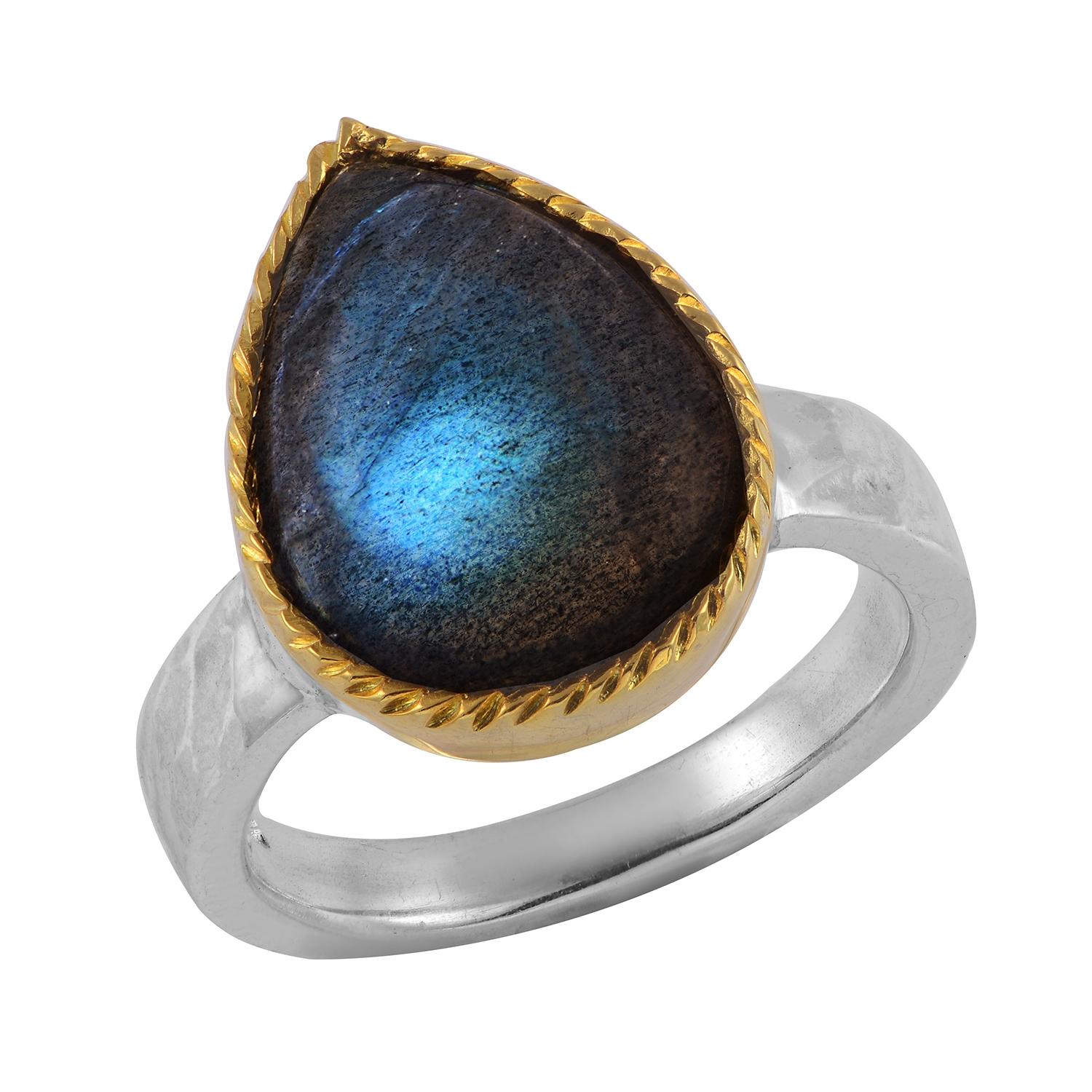 This adorable labradorite teardrop shaped ring is from a limited edition. Handmade in our workshops the ring is made in sterling silver with a hammered shank and the top of the ring is coated in 24ct gold plate.

Dimensions 20mm x 15mm
It is part of