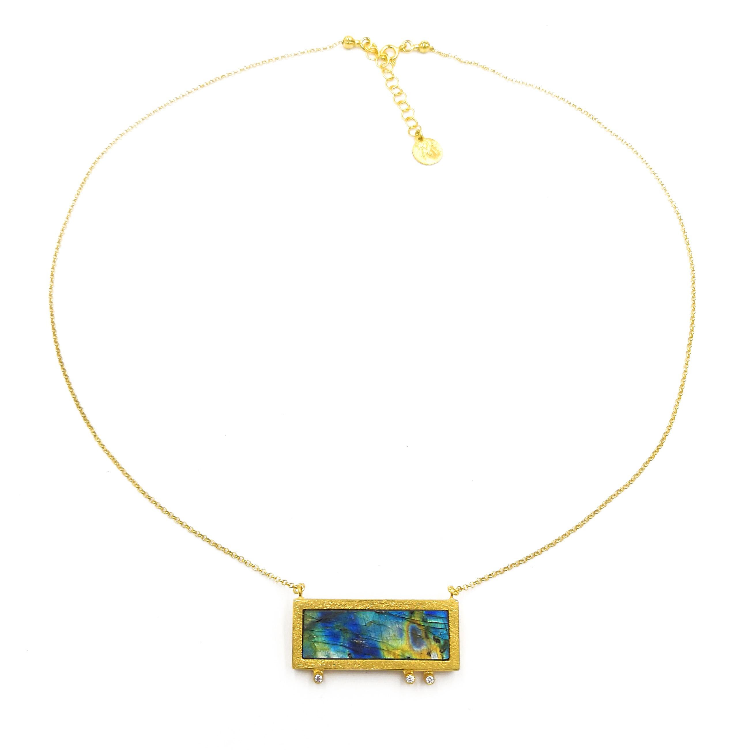 Labradorite Zircon Silver Gold Plade Hand Made Artist Chain Pendant Necklace
Magic Labradorite shows its beauty in one setting. But when it shines, it reveals an amazing beauty, a whole palette of colors. Rectangular stone decorated with a simple