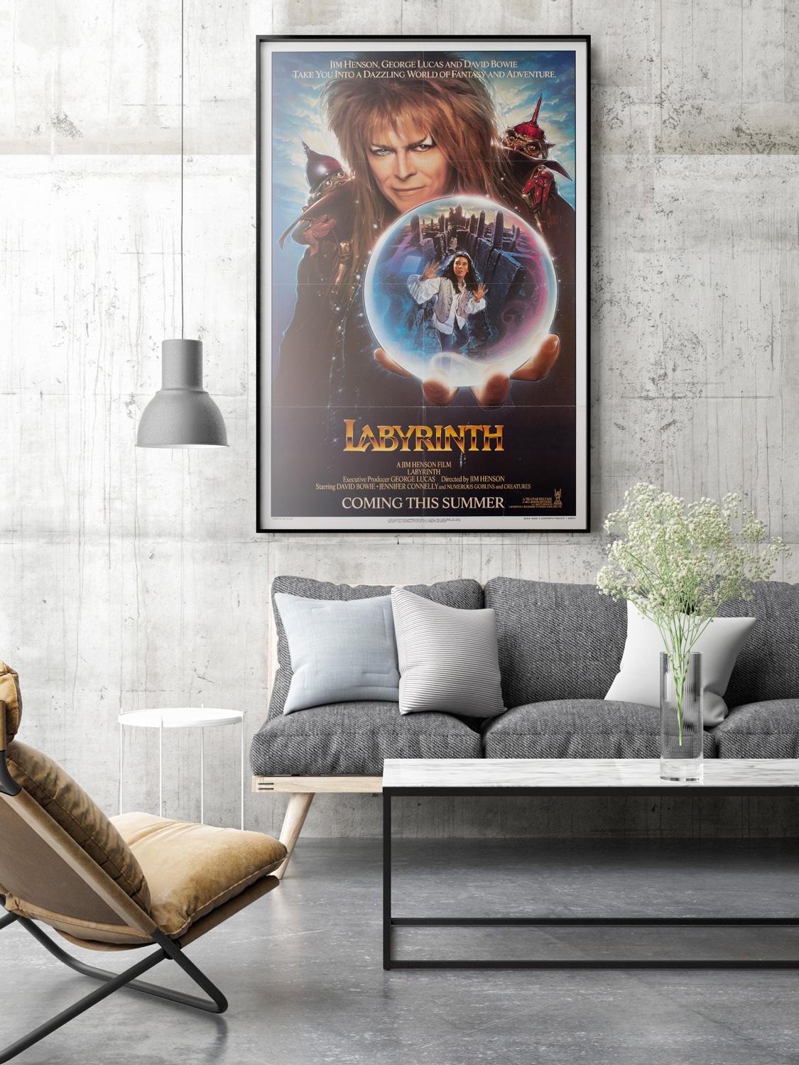 The wonderful country-of-origin teaser film poster for Jim Henson's firm family favourite Labyrinth starring David Bowie and Jennifer Connelly. Very beautifully illustrated by Steven Chorney. 

In Labyrinth sixteen-year-old Sarah (Connelly) is