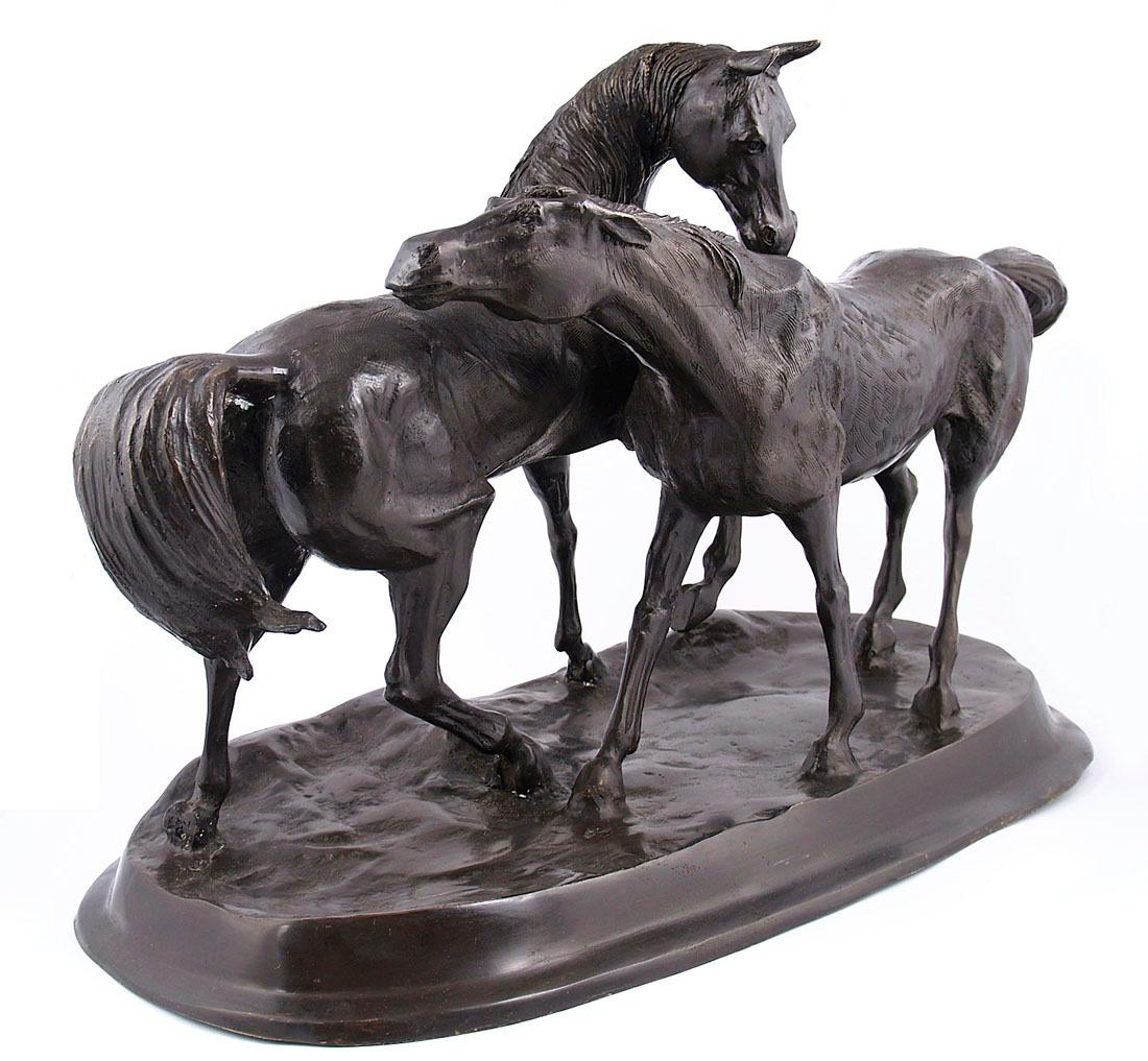 Bronze sculpture of two horses, 20th century
A sculpture of two bronze horses placed on an oval base, facing each other. One of the horses is a stallion, the other is a flirtatious Arabian mare.
The prototype for this figure is a sculpture by