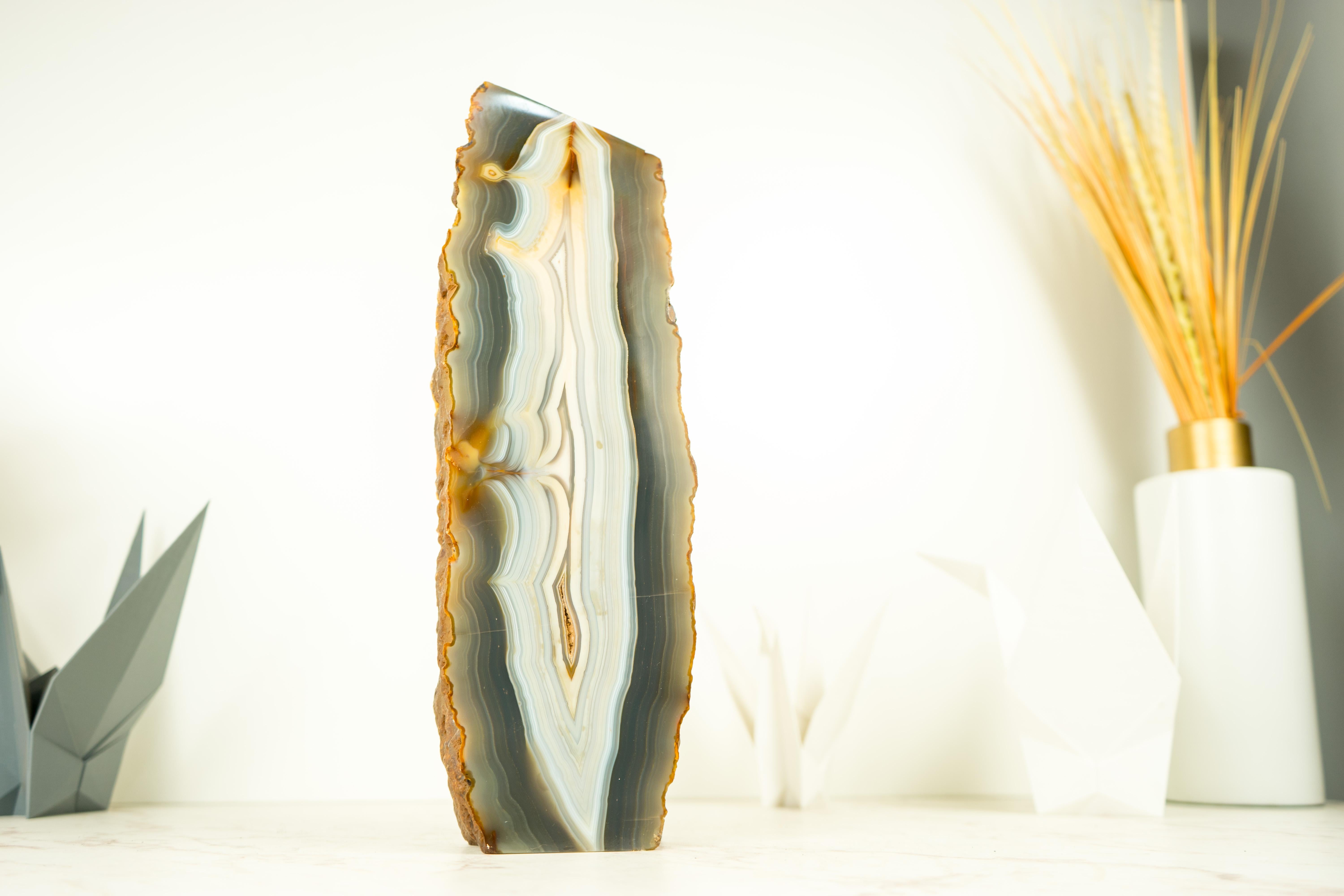 Rare Lace Agate Geode, The Perfect Untreated Agate with the Rarest Colors

• Description

A gorgeous medium-sized Banded Agate Geode, this beauty presents us with a one-of-a-kind lace agate formation with complex yet simple lines that represent the