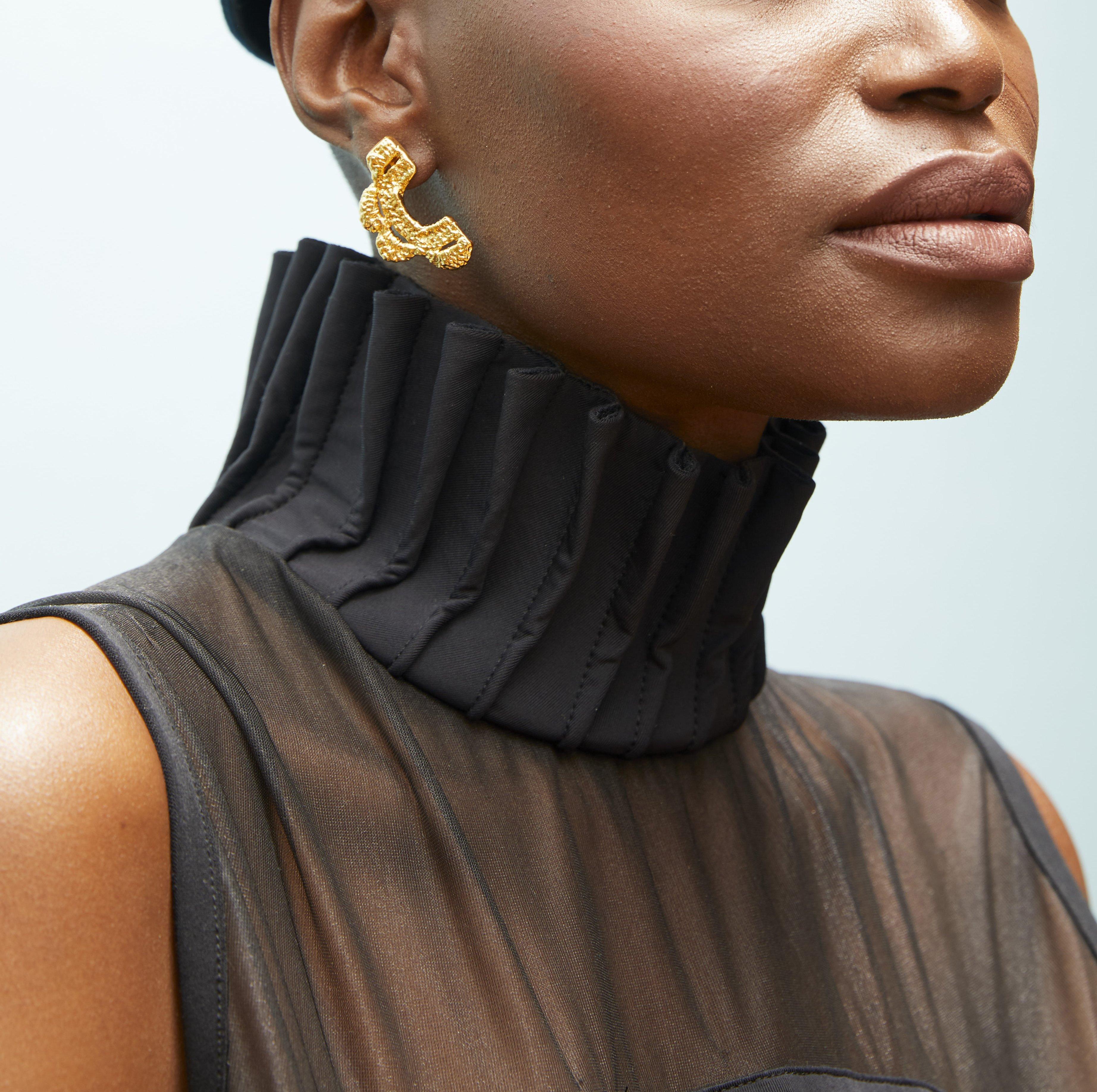 The lace crochet mini Randal earrings are part of the signature collection Lace crochet designed by Alexandra Koumba. These elegant half scallops fall perfectly into place hanging in a way that enhances the cheek and contour of the face and are very