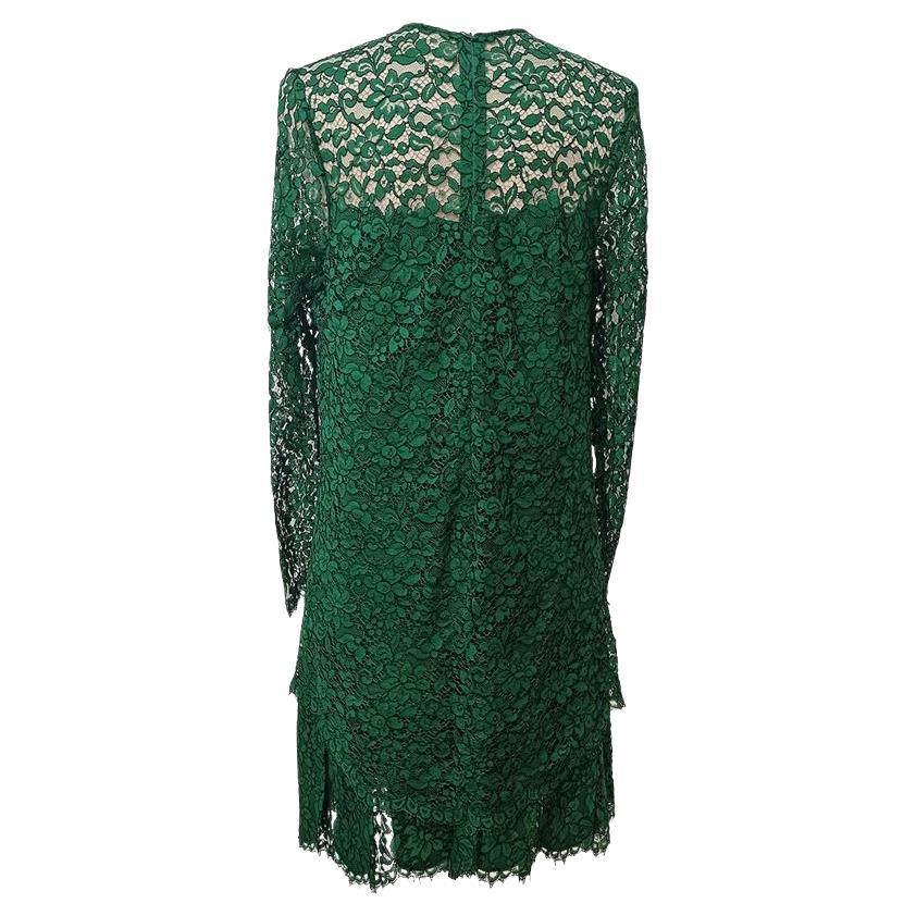 Viscose (46%) cotton (39%) and nylon Silk lining Green color Long sleeve Amazing total construction of fine lace Shoulder/hem length cm 85 (334 inches) Shoulder cm 36 (141 inches)

