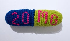 20 mg (2022) by street artist Lace In The Moon, textile crochet yarn Rx capsule